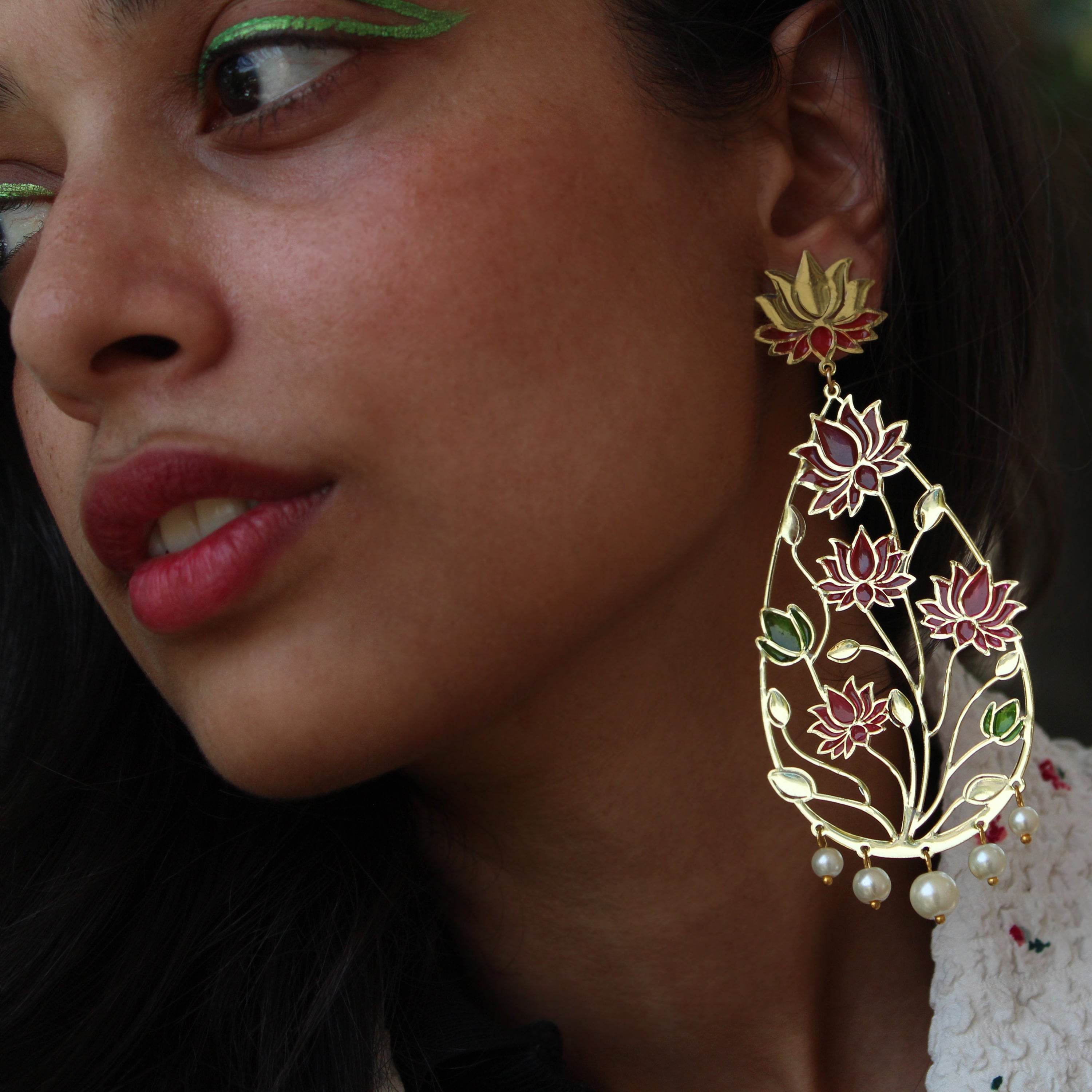 Traditional Kundan earrings in gold-tone, perfect for weddings and festive wear