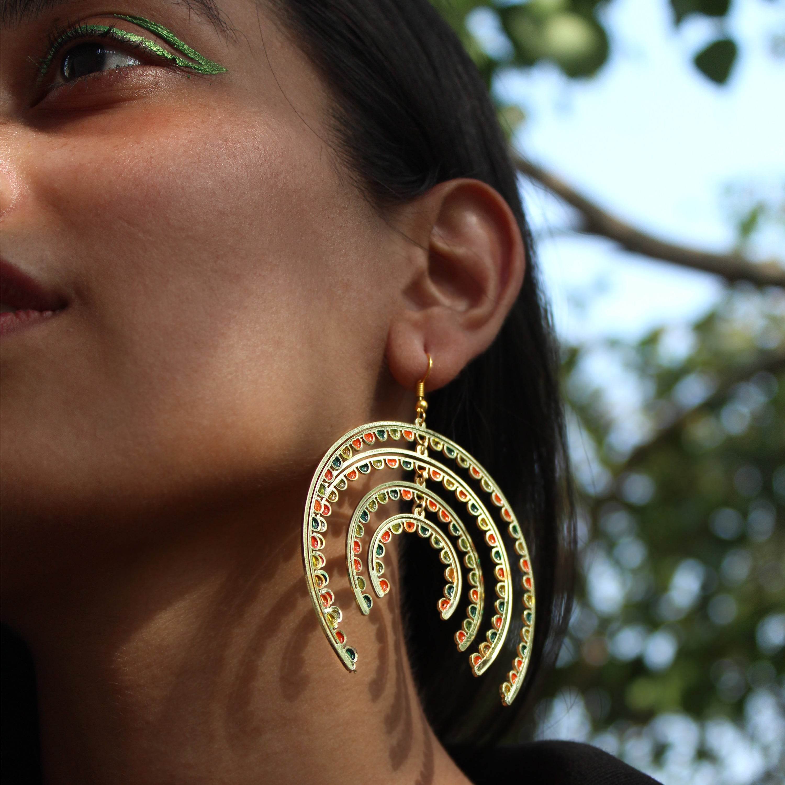 Traditional Kundan earrings in gold-tone, perfect for weddings and festive wear