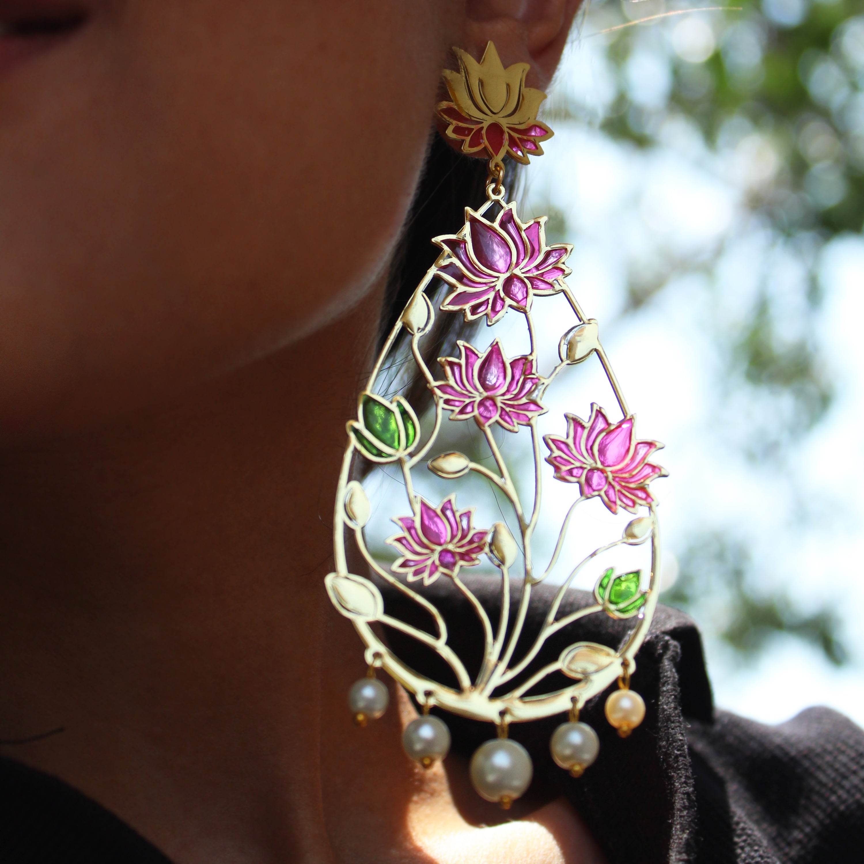 Traditional Kundan earrings in gold-tone, perfect for weddings and festive wear