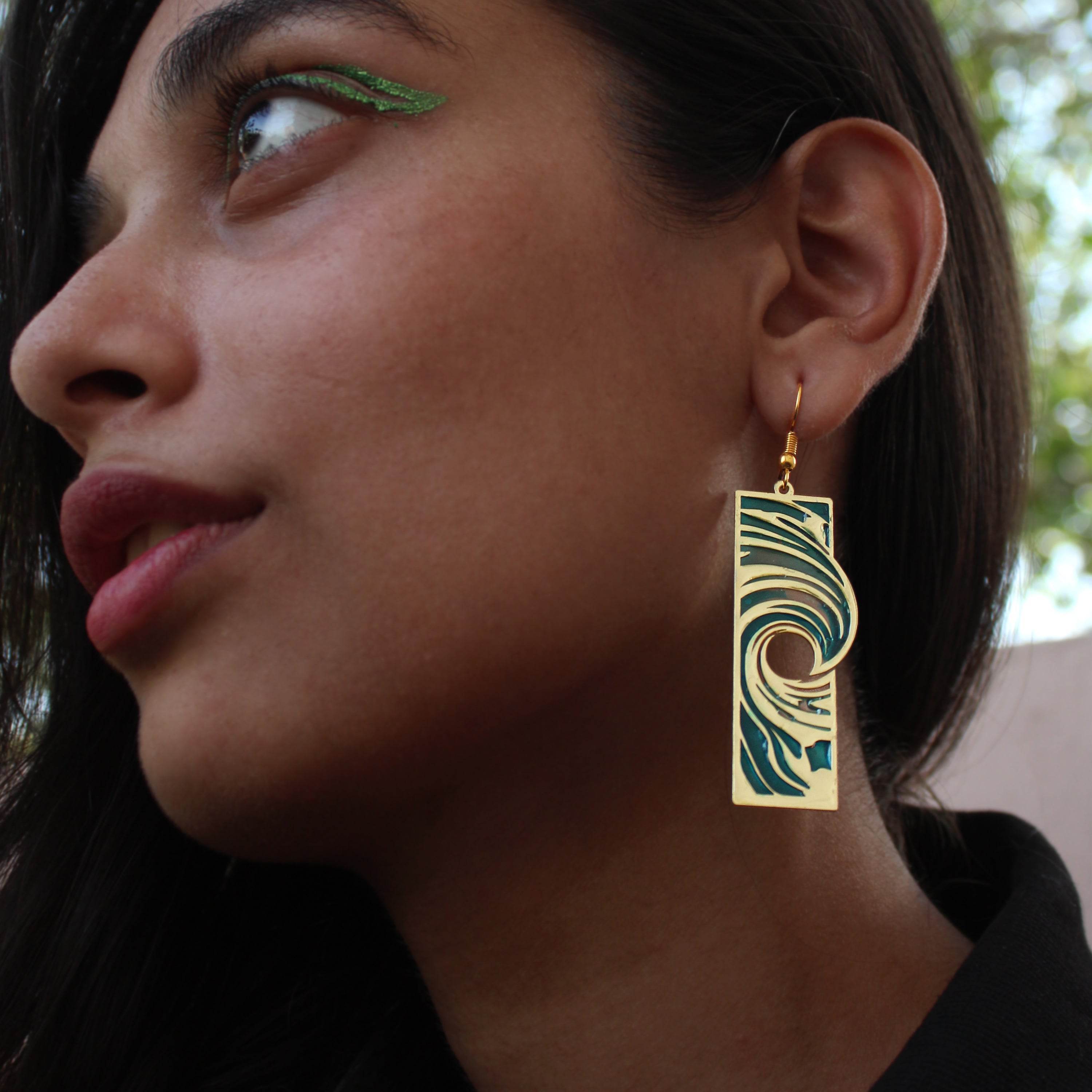 Traditional Kundan earrings in gold-tone, perfect for weddings and festive wear