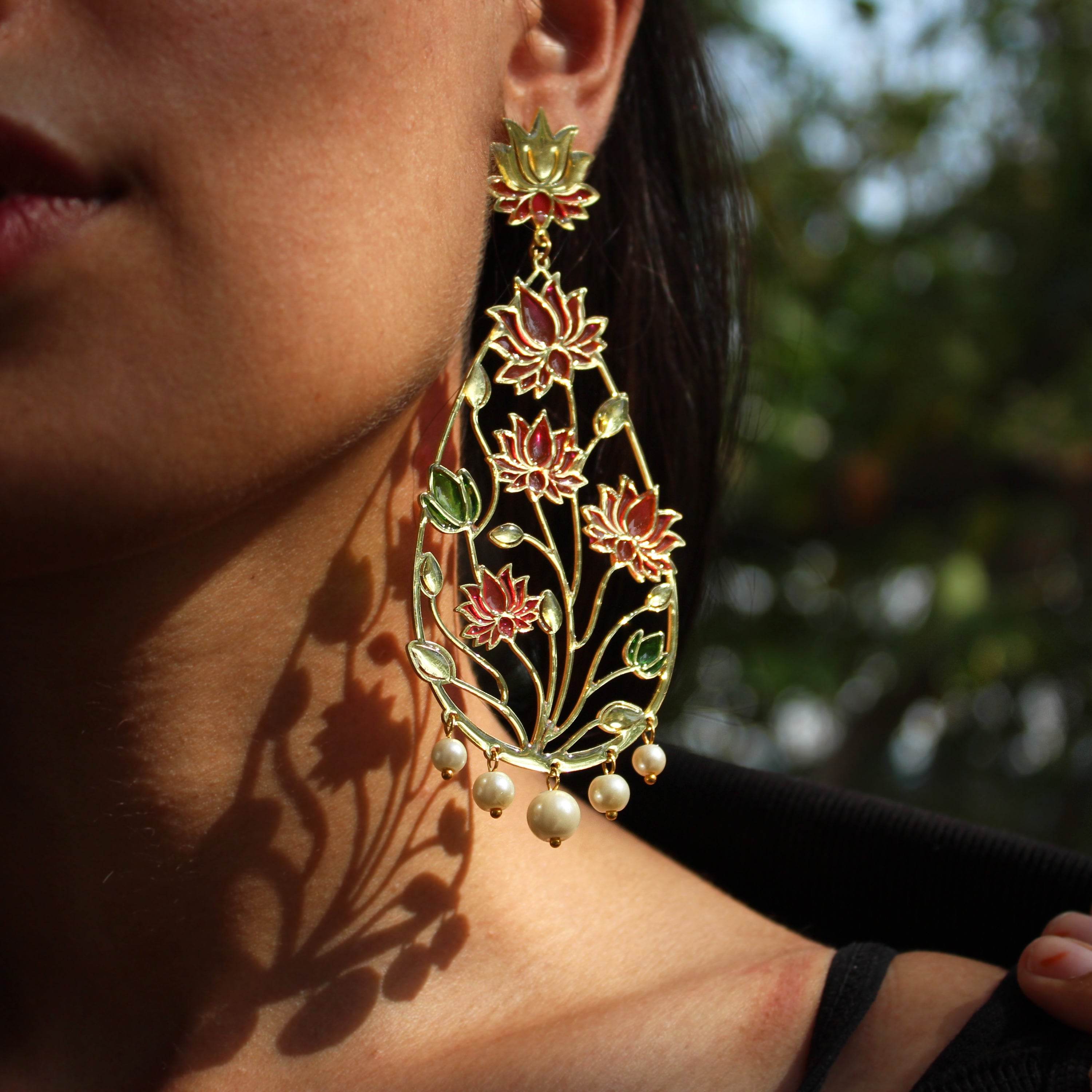 Traditional Kundan earrings in gold-tone, perfect for weddings and festive wear
