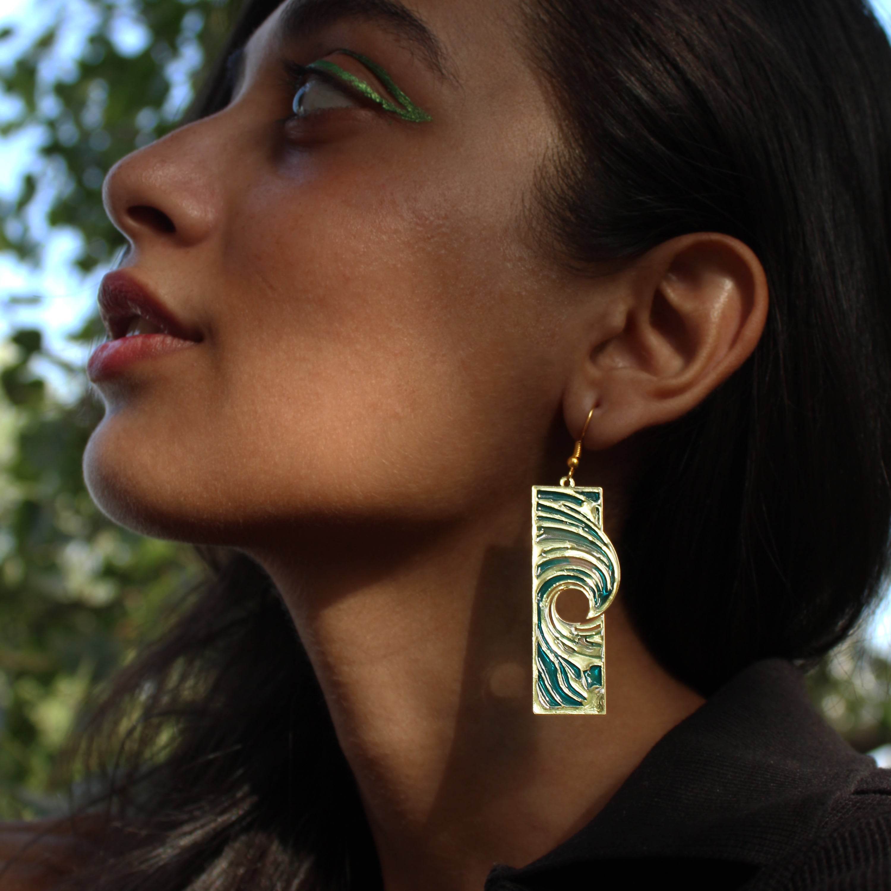 Traditional Kundan earrings in gold-tone, perfect for weddings and festive wear