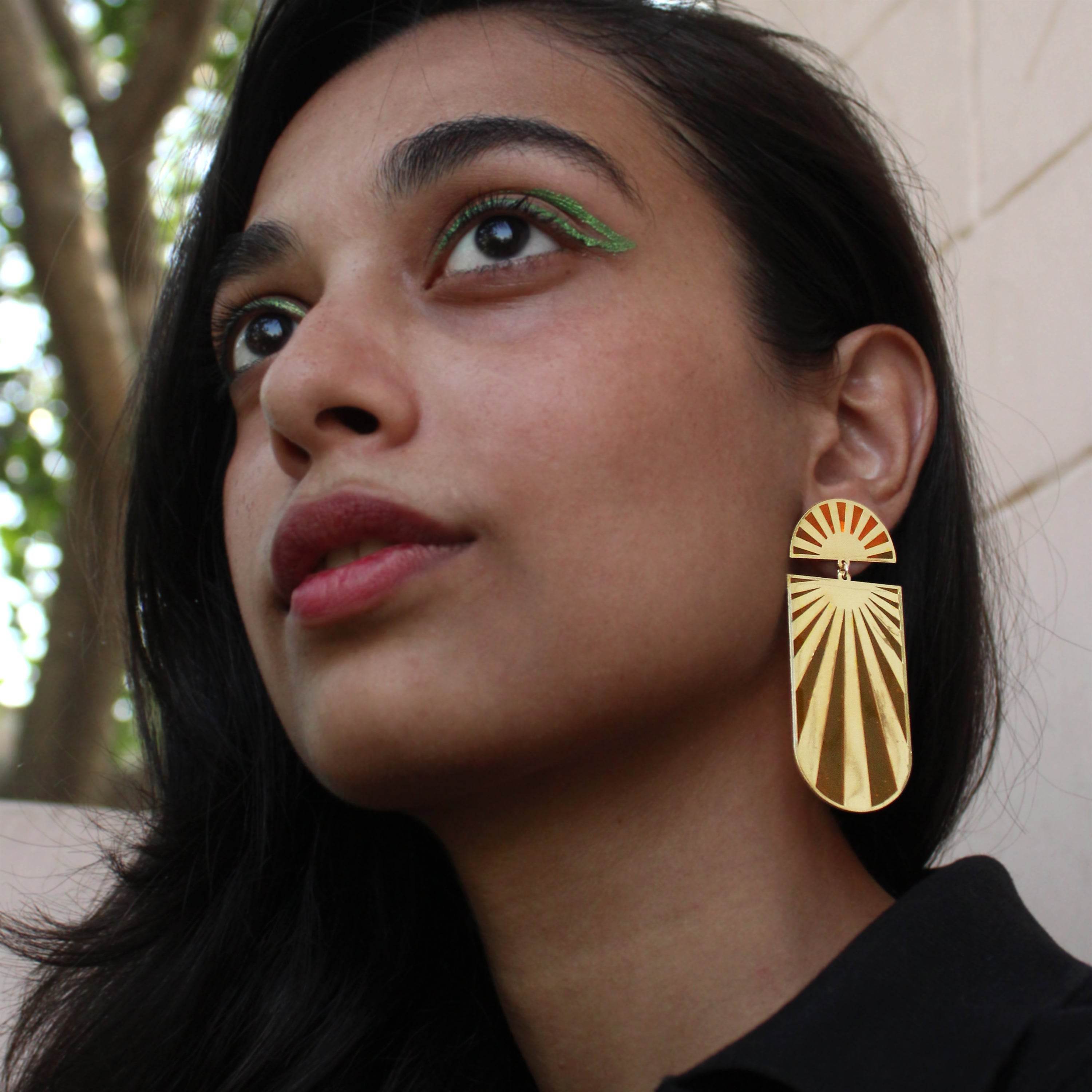 Traditional Kundan earrings in gold-tone, perfect for weddings and festive wear