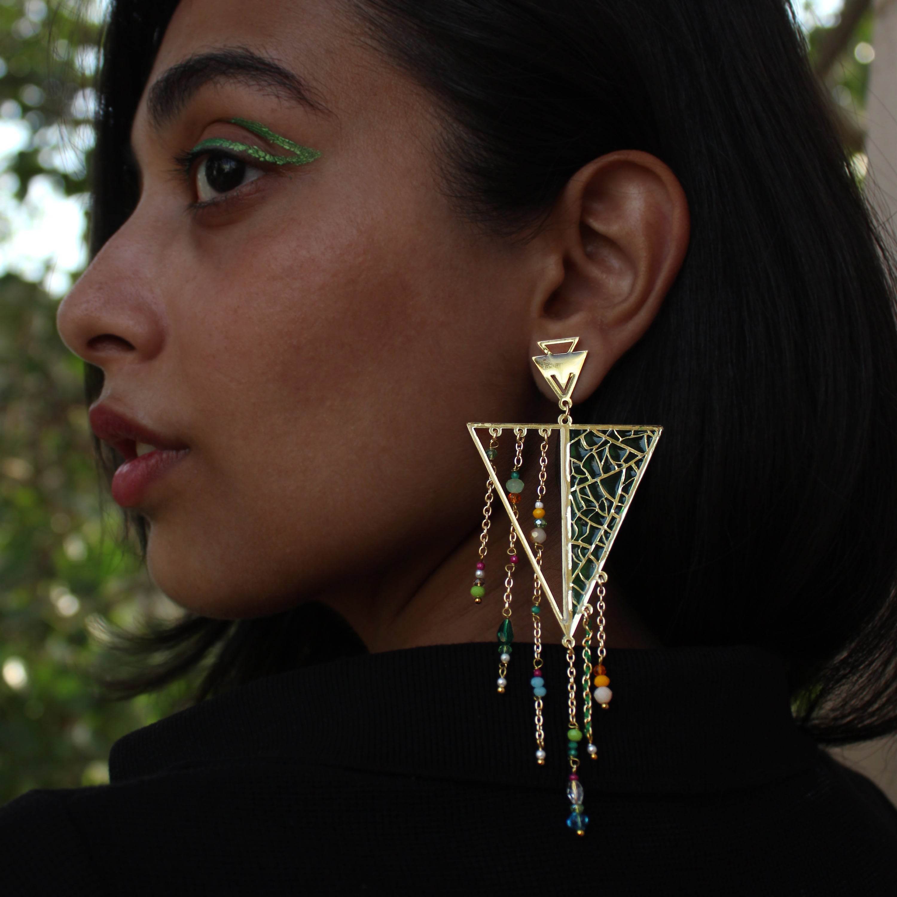 Traditional Kundan earrings in gold-tone, perfect for weddings and festive wear