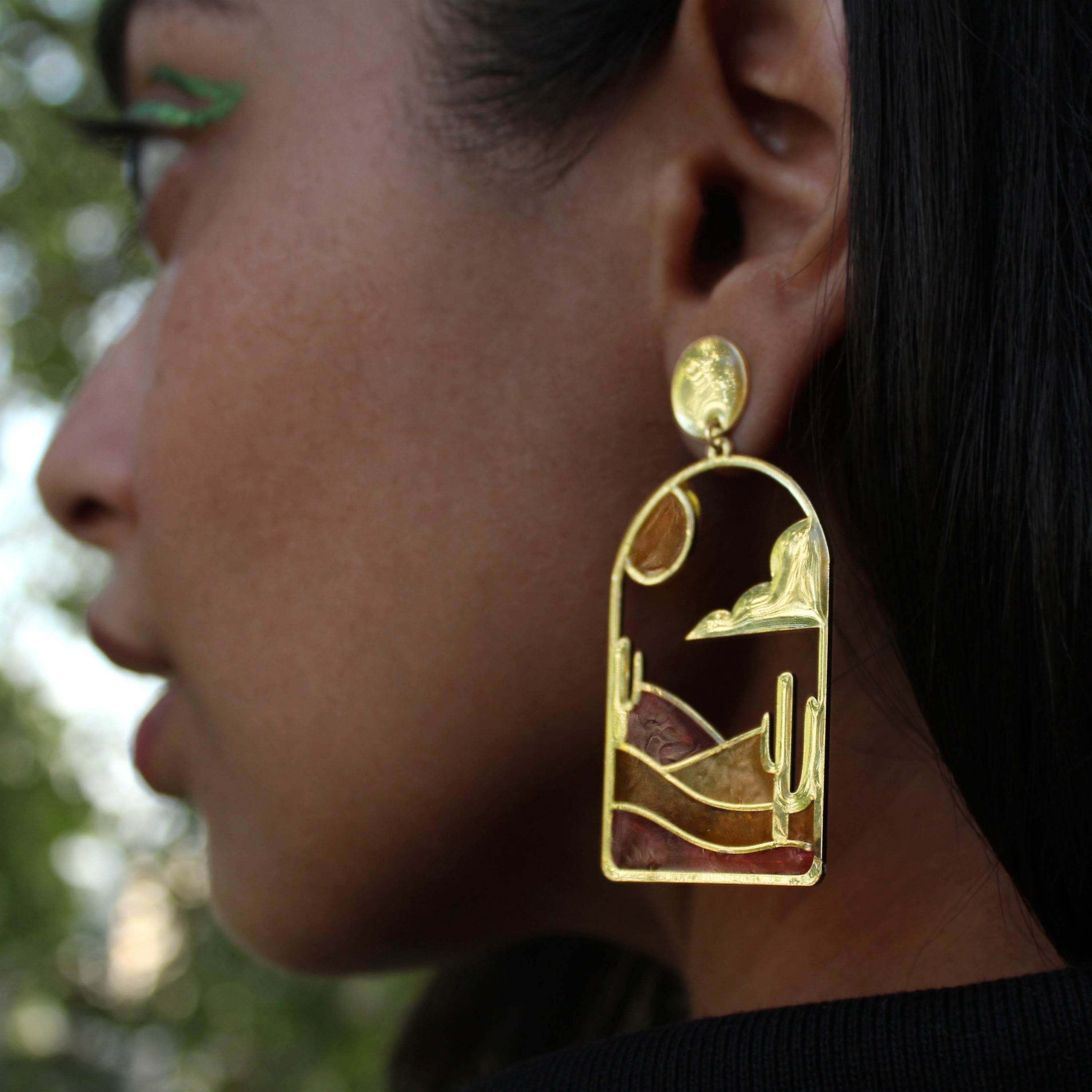 Traditional Kundan earrings in gold-tone, perfect for weddings and festive wear