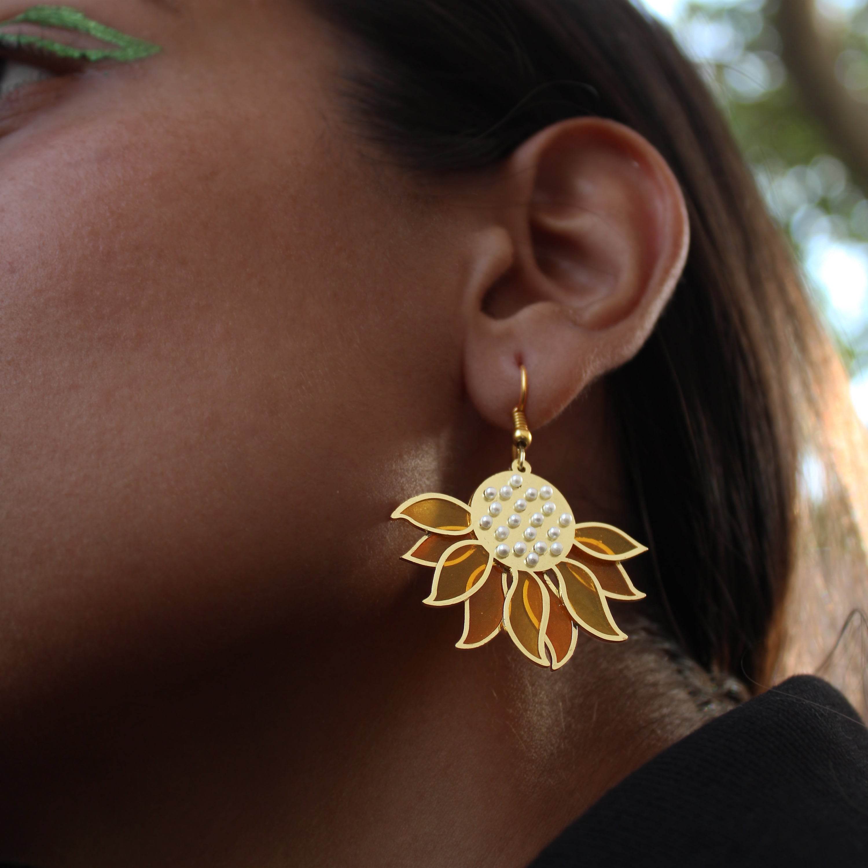 Traditional Kundan earrings in gold-tone, perfect for weddings and festive wear