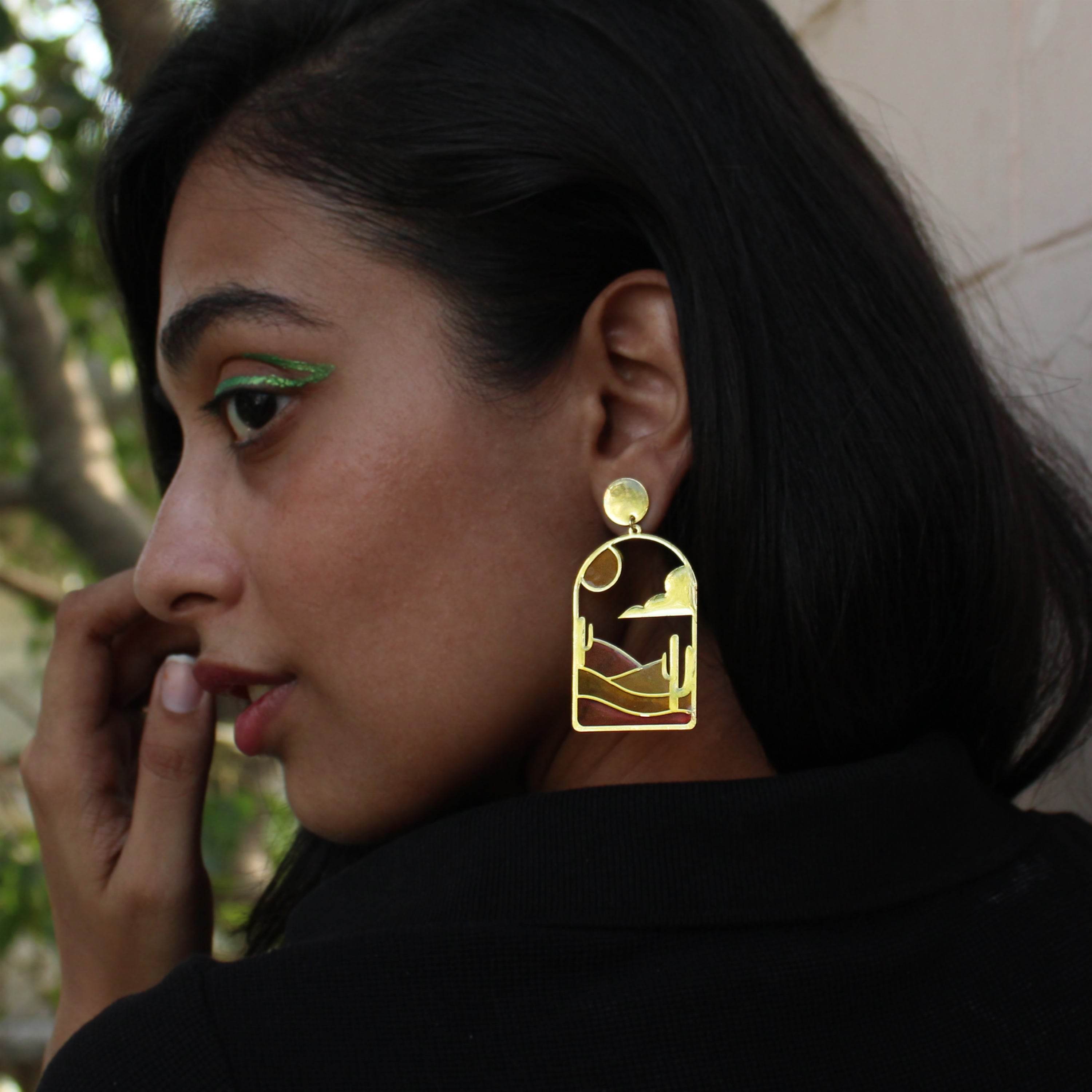 Traditional Kundan earrings in gold-tone, perfect for weddings and festive wear