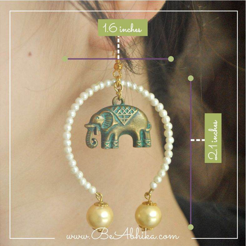 Traditional Kundan earrings in gold-tone, perfect for weddings and festive wear