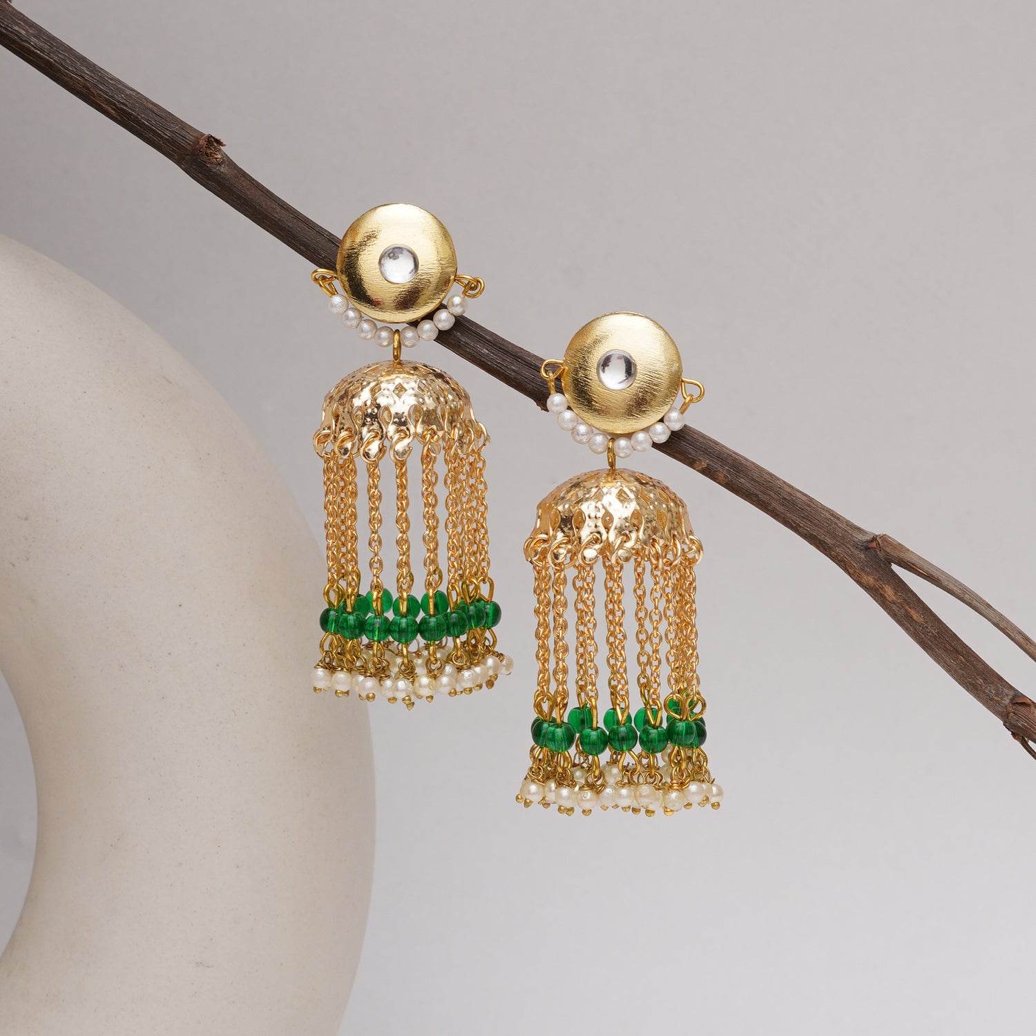 Traditional Kundan earrings in gold-tone, perfect for weddings and festive wear