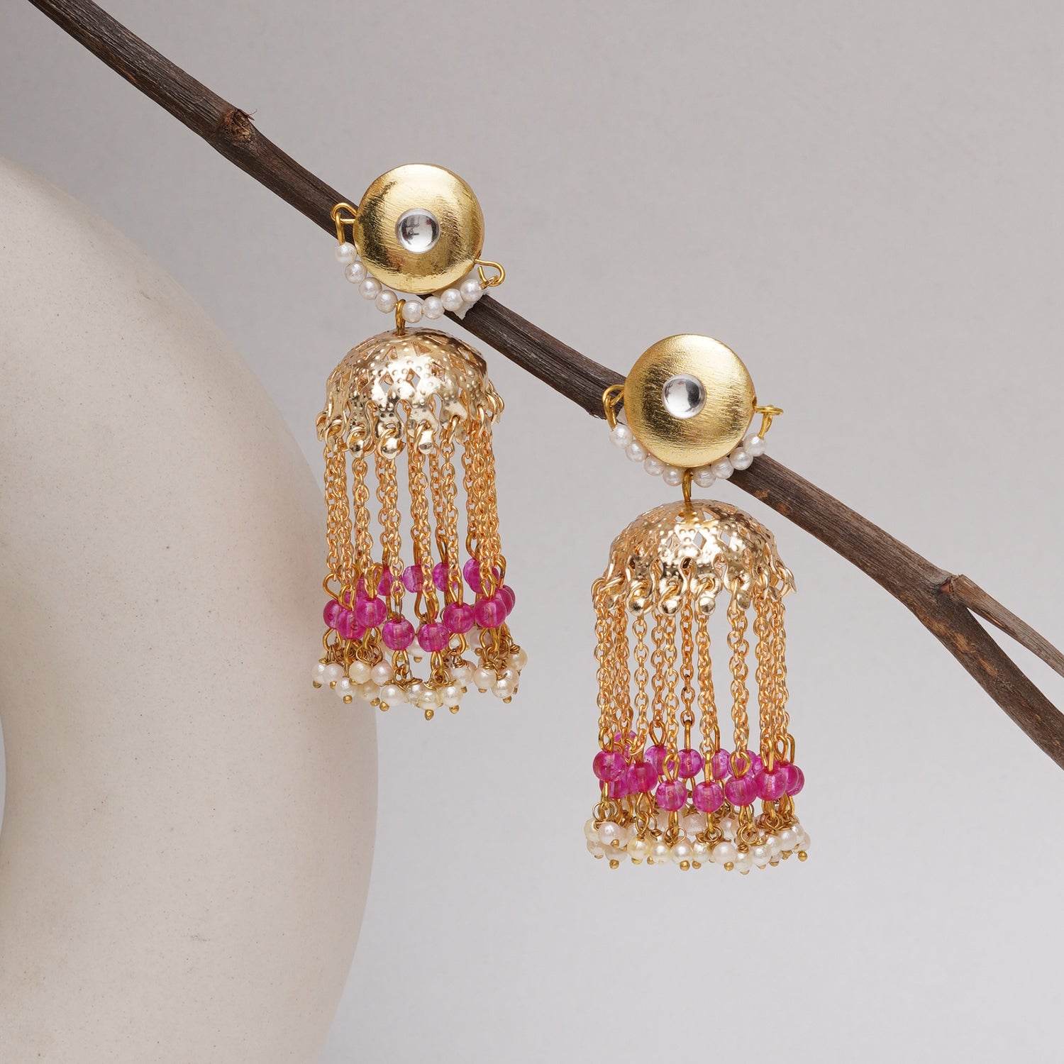 Traditional Kundan earrings in gold-tone, perfect for weddings and festive wear