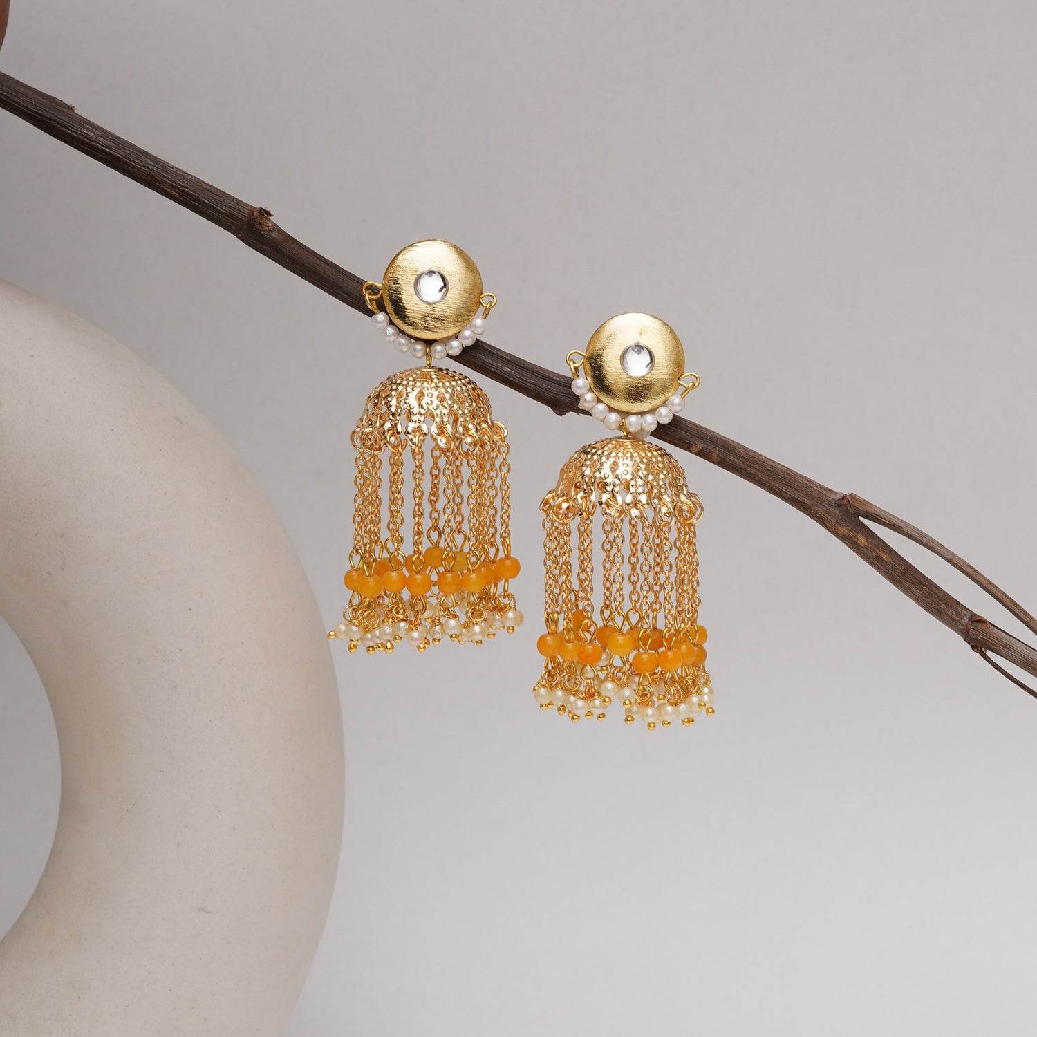 Traditional Kundan earrings in gold-tone, perfect for weddings and festive wear