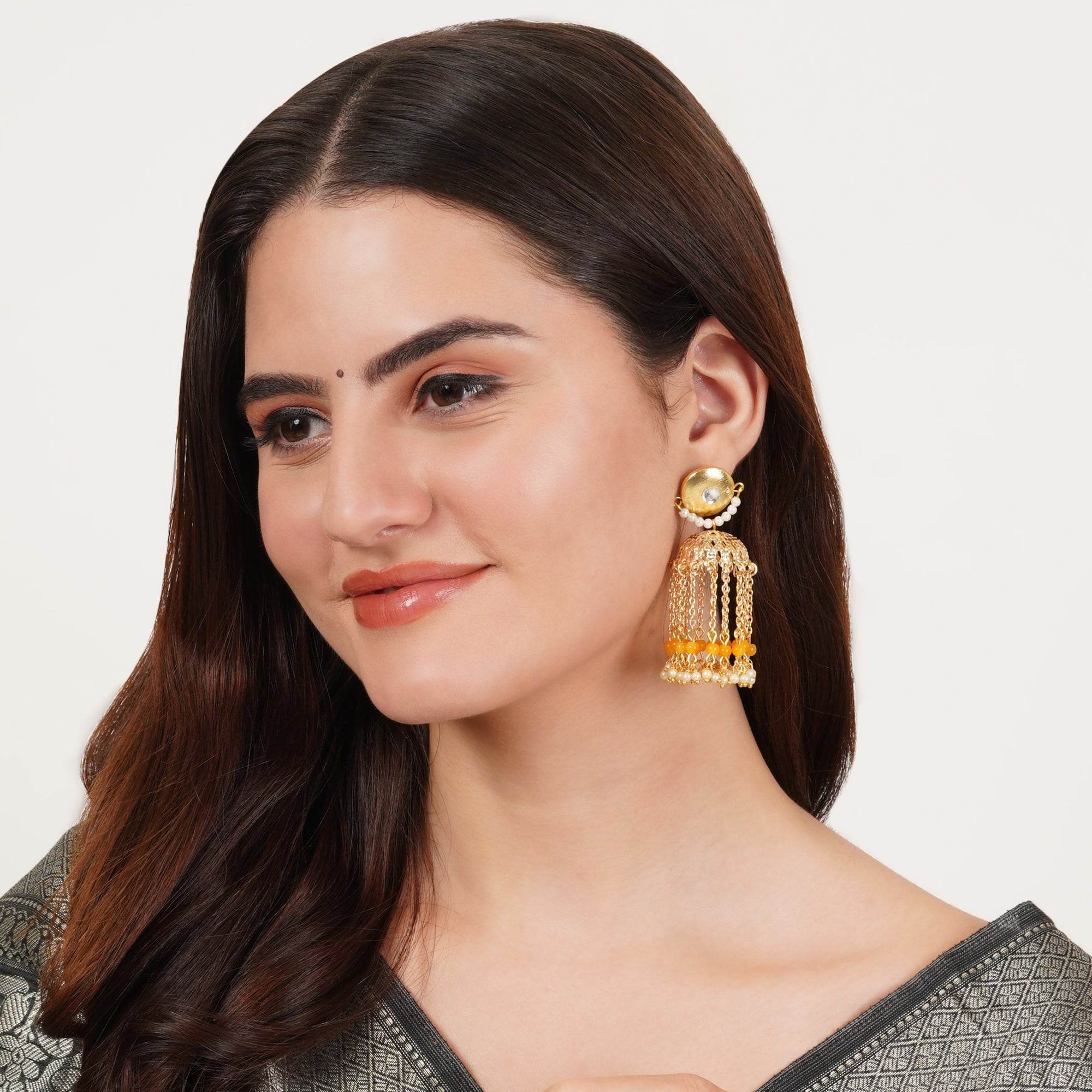 Traditional Kundan earrings in gold-tone, perfect for weddings and festive wear
