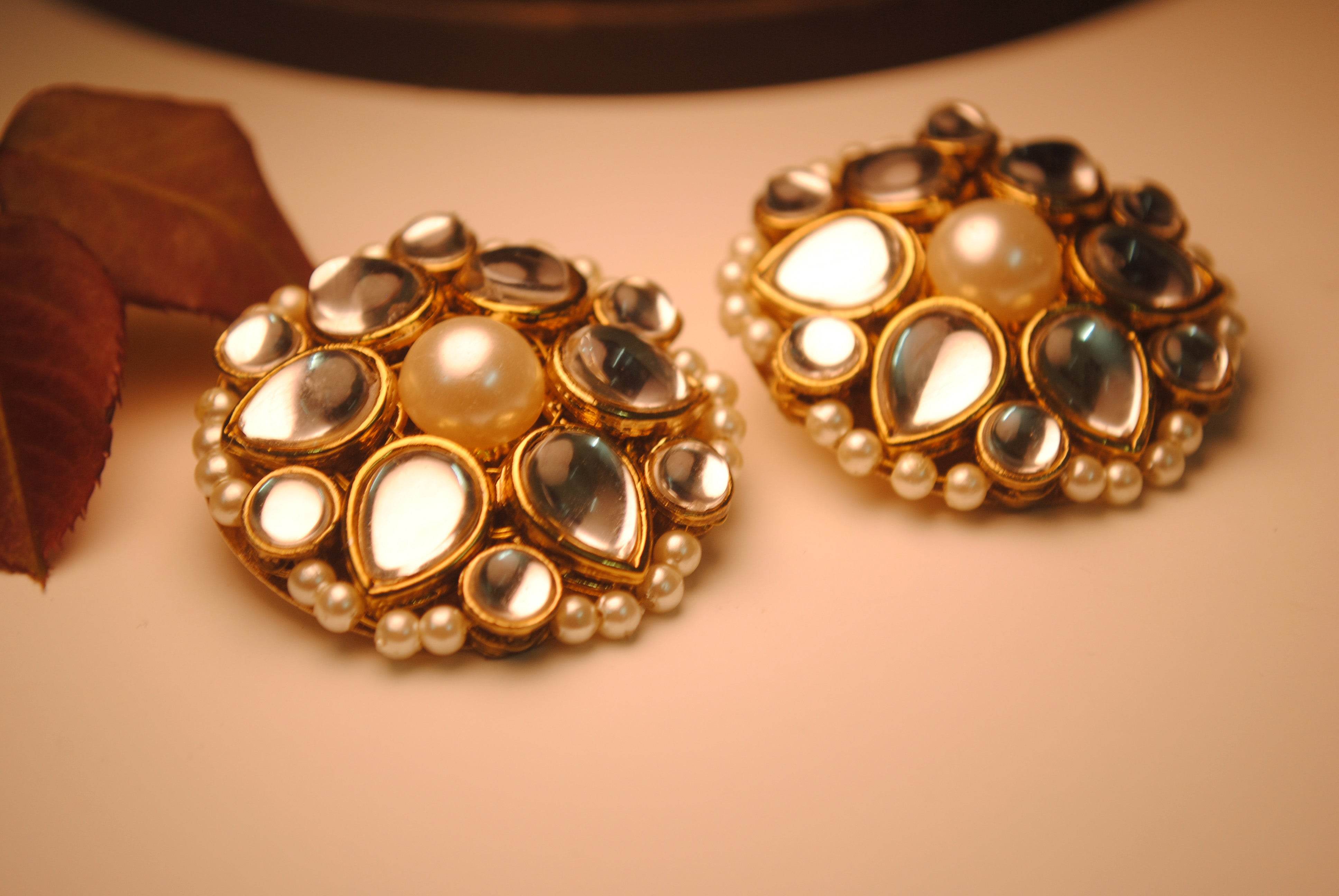 Traditional Kundan earrings in gold-tone, perfect for weddings and festive wear