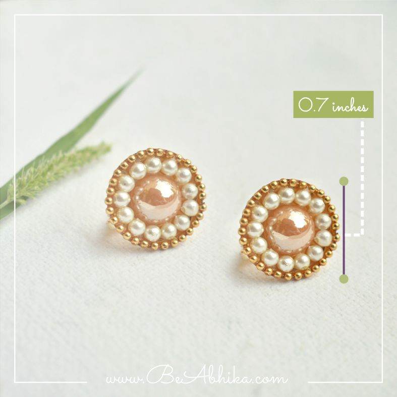 Traditional Kundan earrings in gold-tone, perfect for weddings and festive wear
