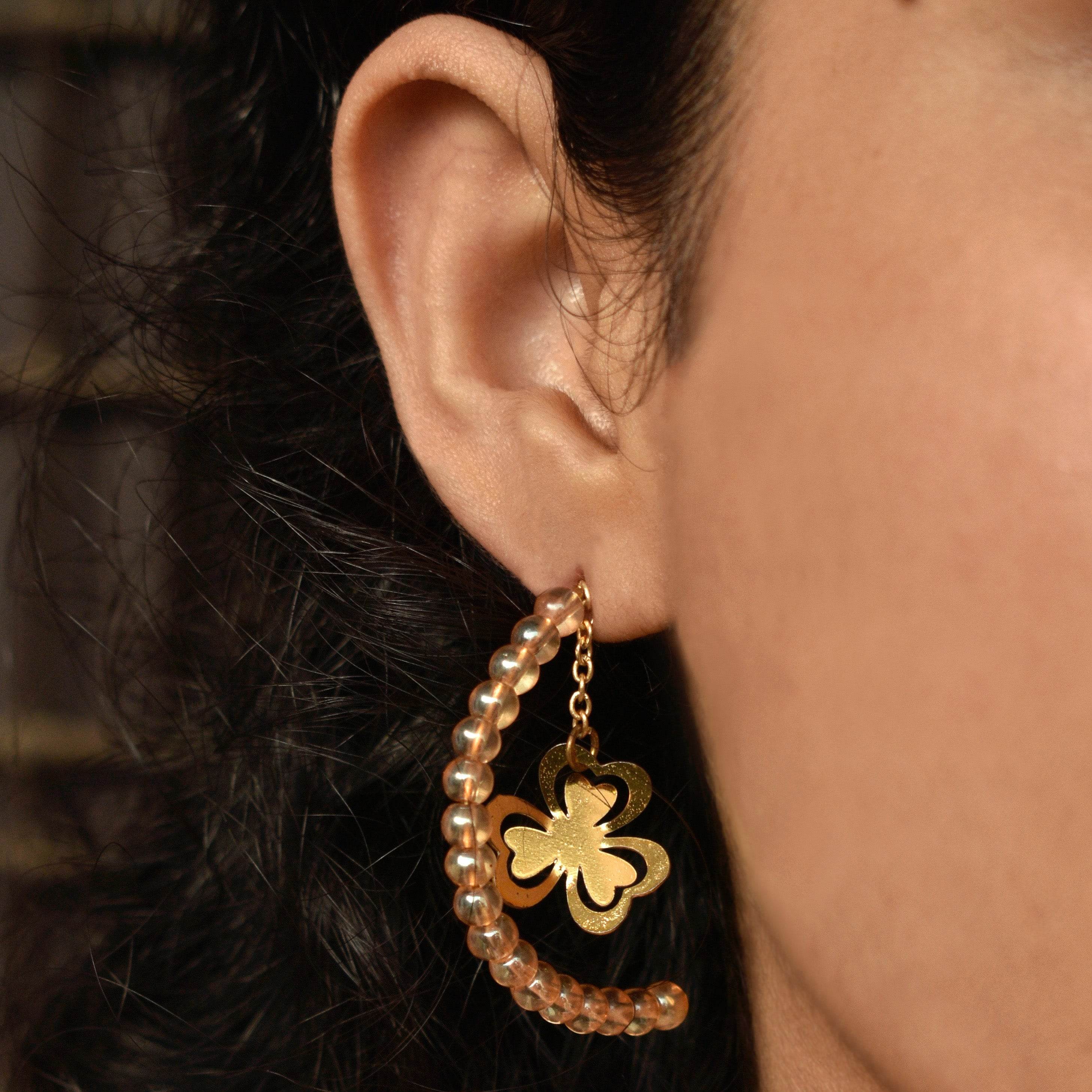 Traditional Kundan earrings in gold-tone, perfect for weddings and festive wear