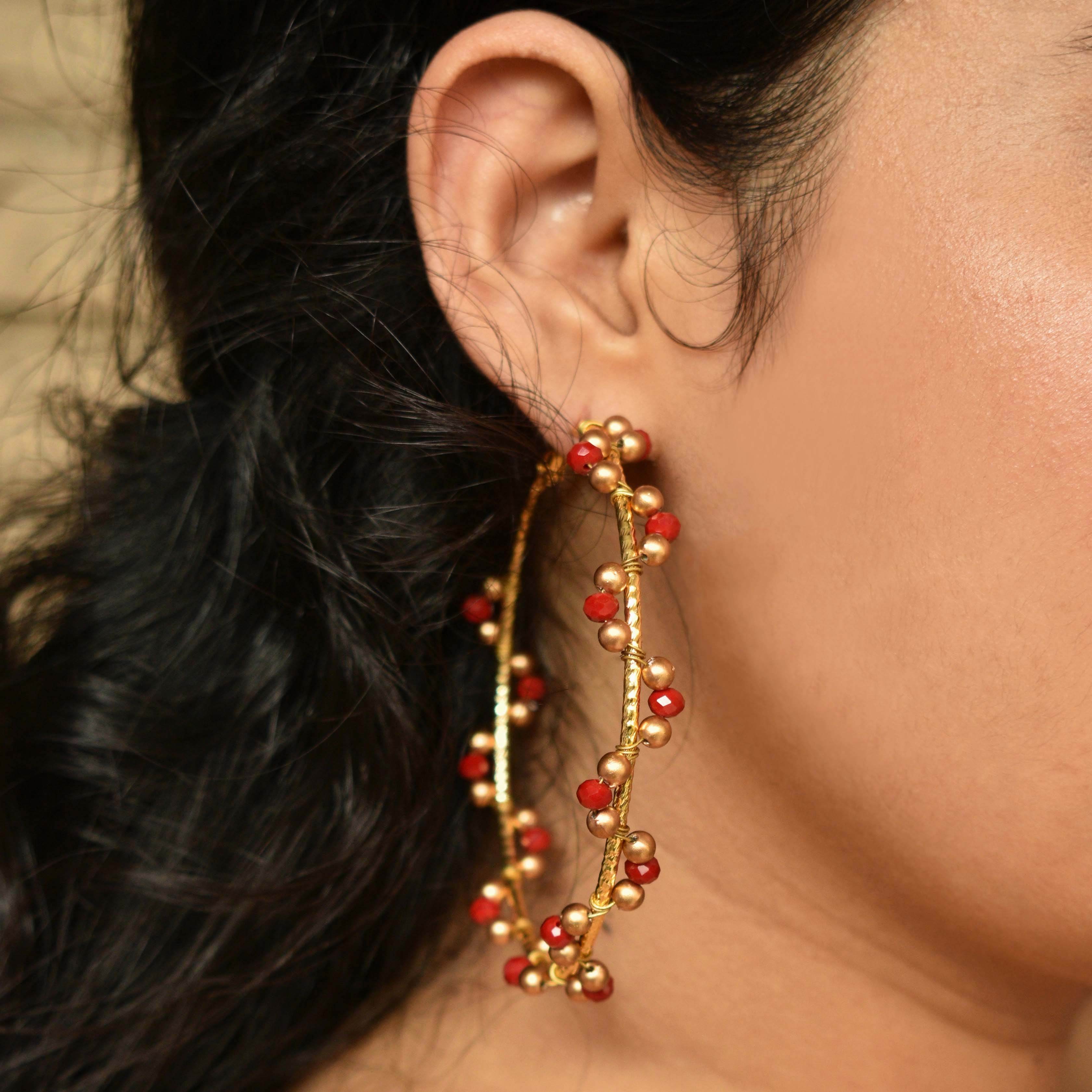 Traditional Kundan earrings in gold-tone, perfect for weddings and festive wear