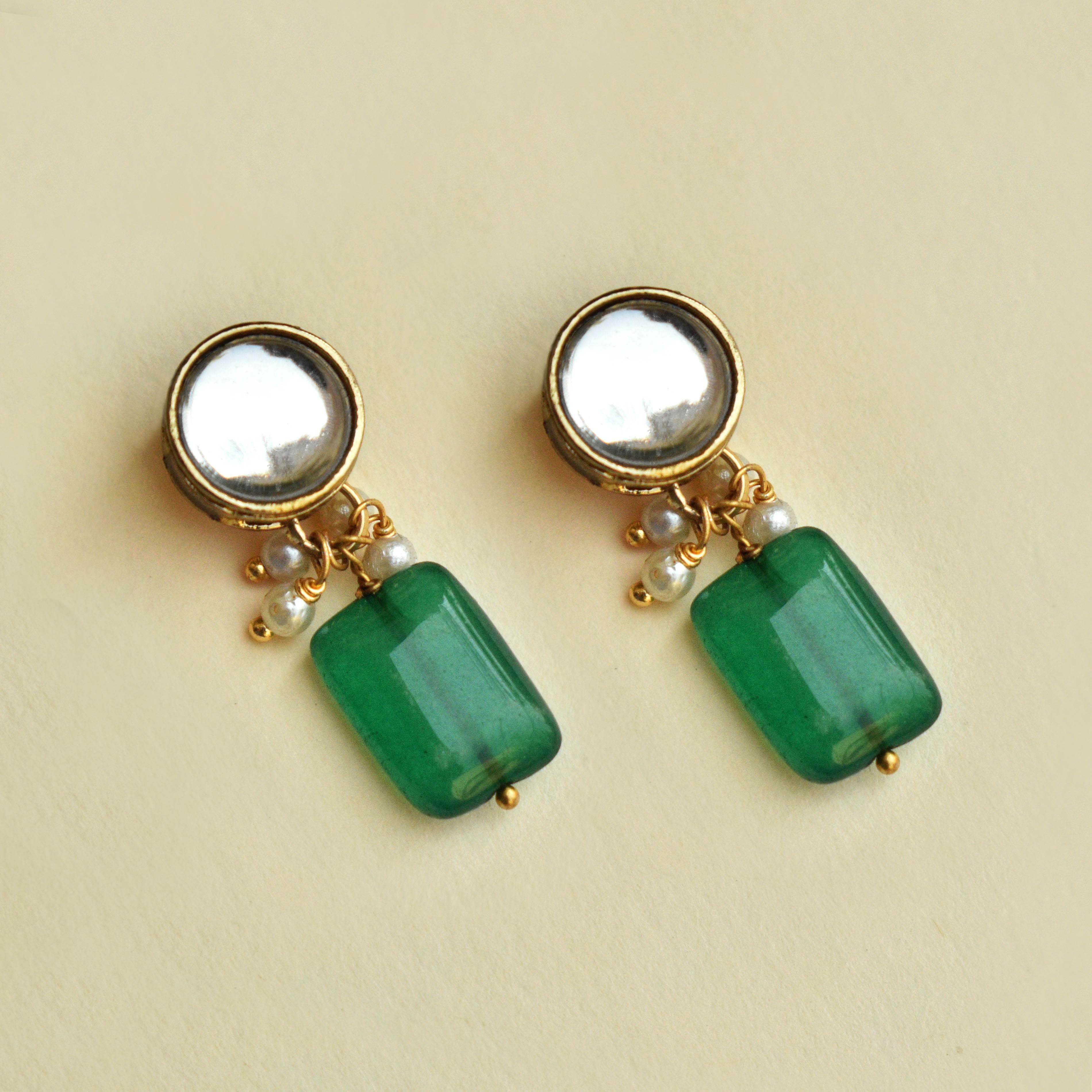 Traditional Kundan earrings in gold-tone, perfect for weddings and festive wear