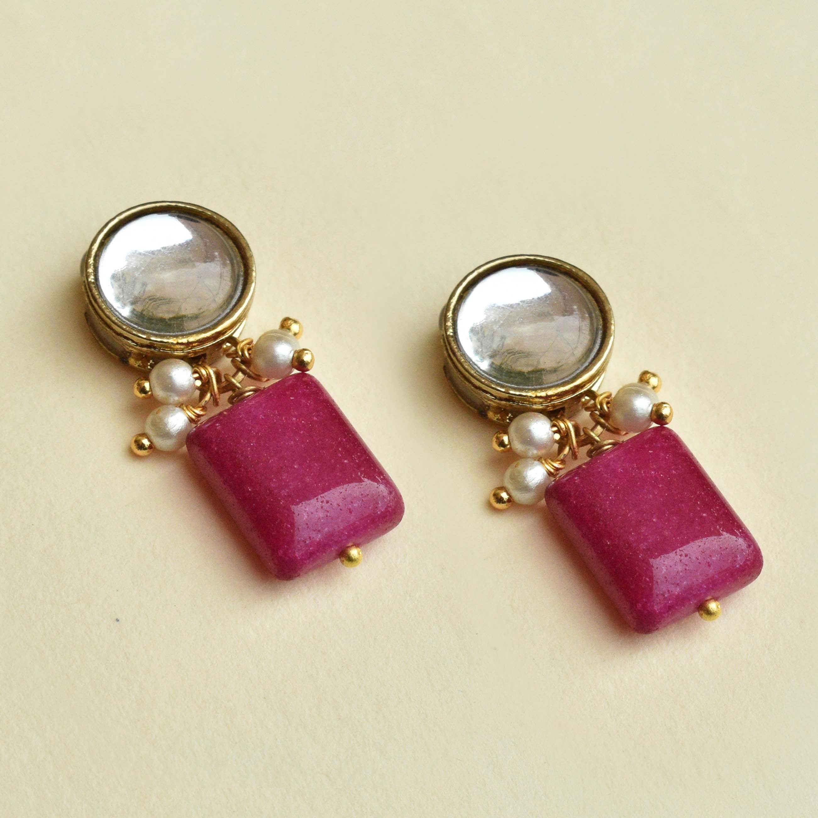 Traditional Kundan earrings in gold-tone, perfect for weddings and festive wear