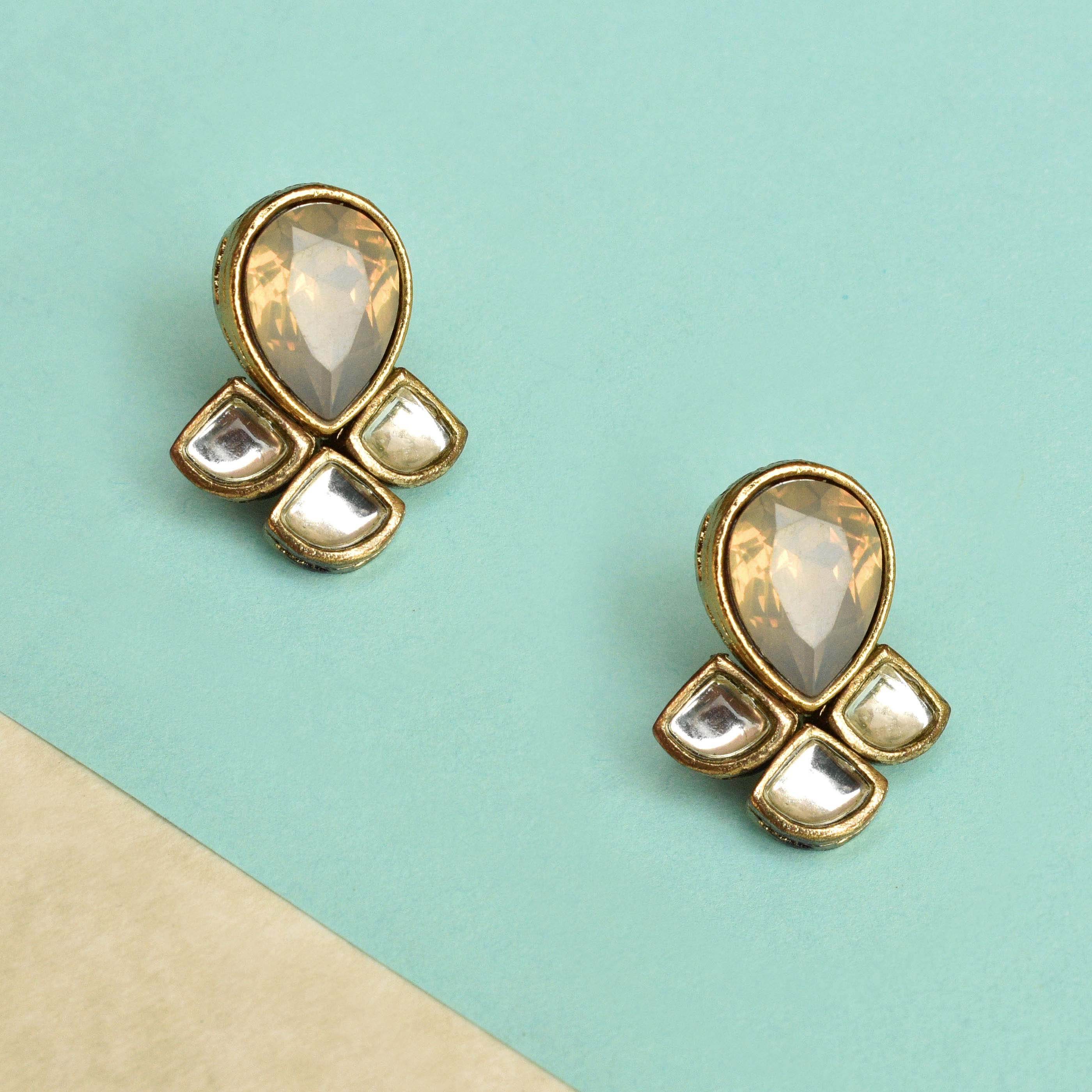 Traditional Kundan earrings in gold-tone, perfect for weddings and festive wear