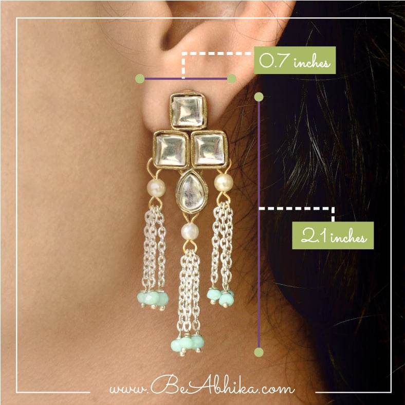 Traditional Kundan earrings in gold-tone, perfect for weddings and festive wear