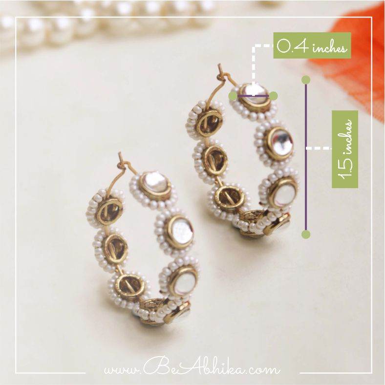 Traditional Kundan earrings in gold-tone, perfect for weddings and festive wear