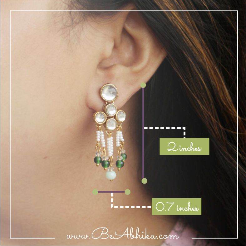 Traditional Kundan earrings in gold-tone, perfect for weddings and festive wear