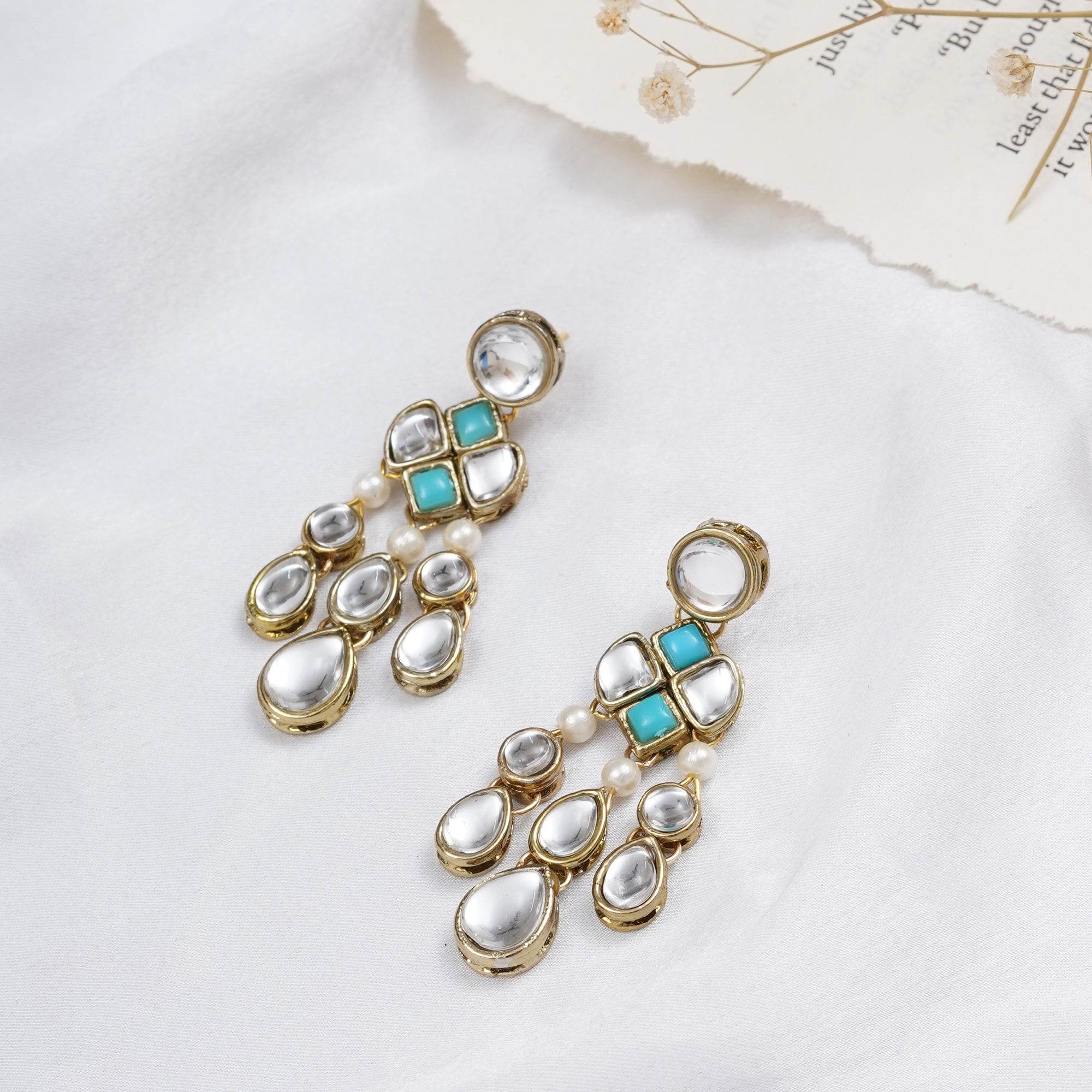 Traditional Kundan earrings in gold-tone, perfect for weddings and festive wear