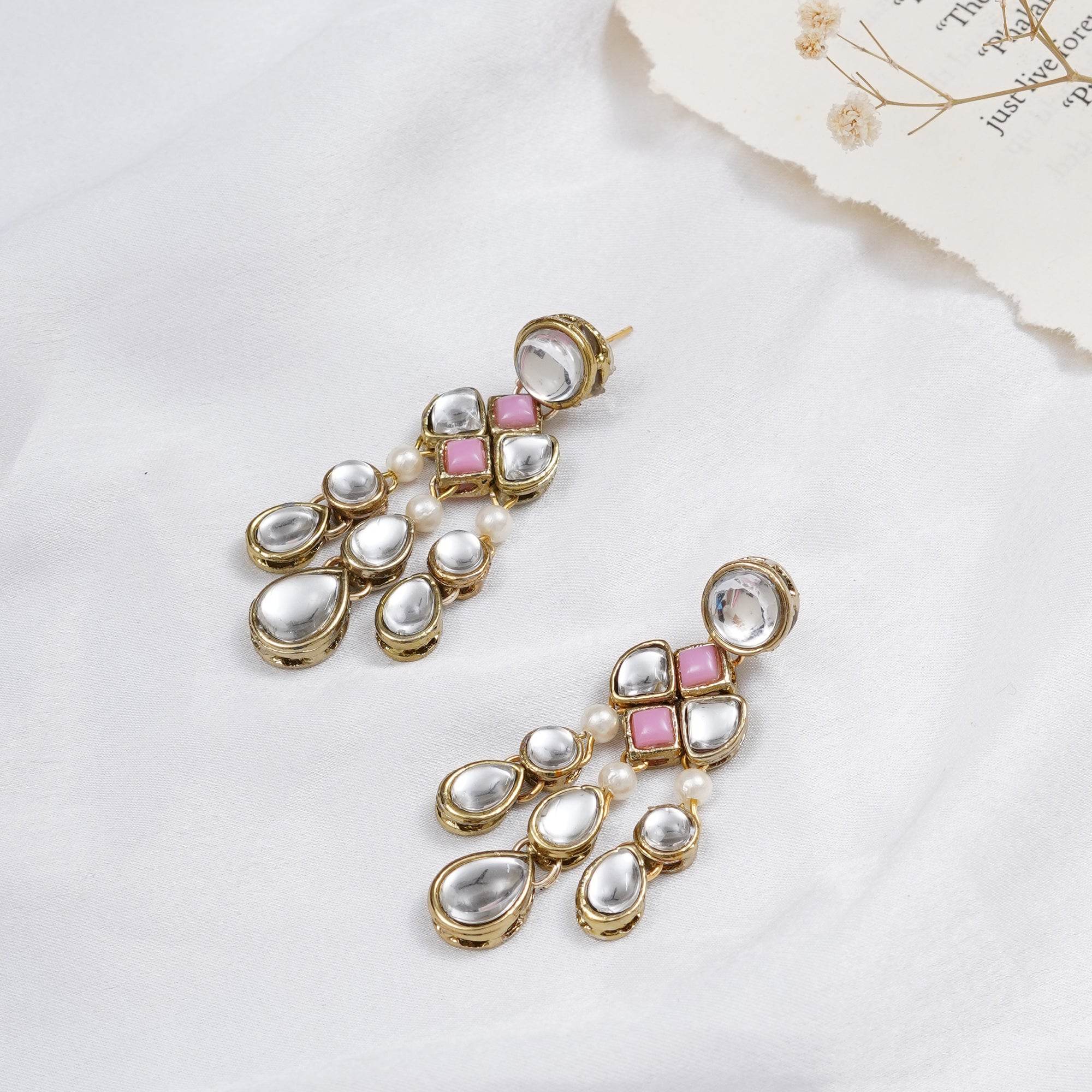 Traditional Kundan earrings in gold-tone, perfect for weddings and festive wear