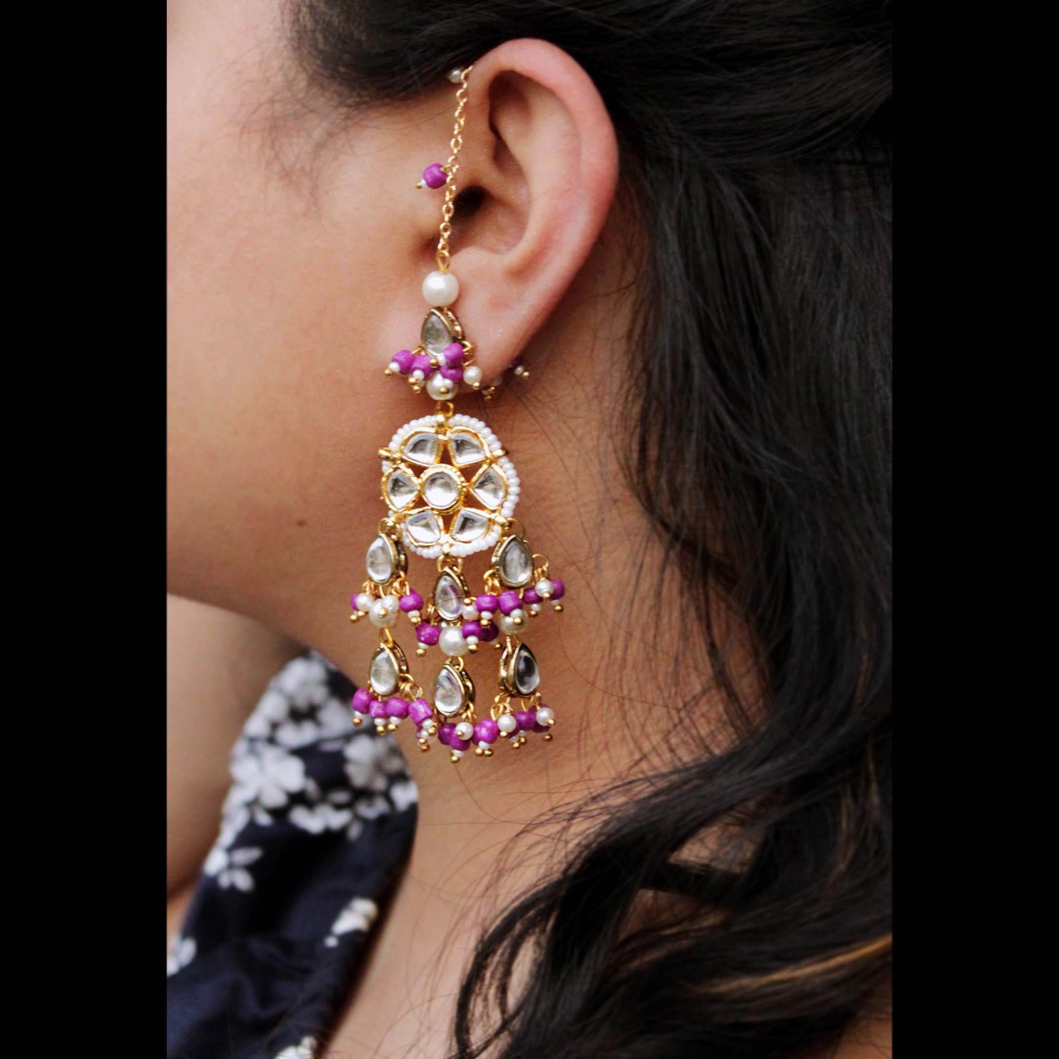 Traditional Kundan earrings in gold-tone, perfect for weddings and festive wear