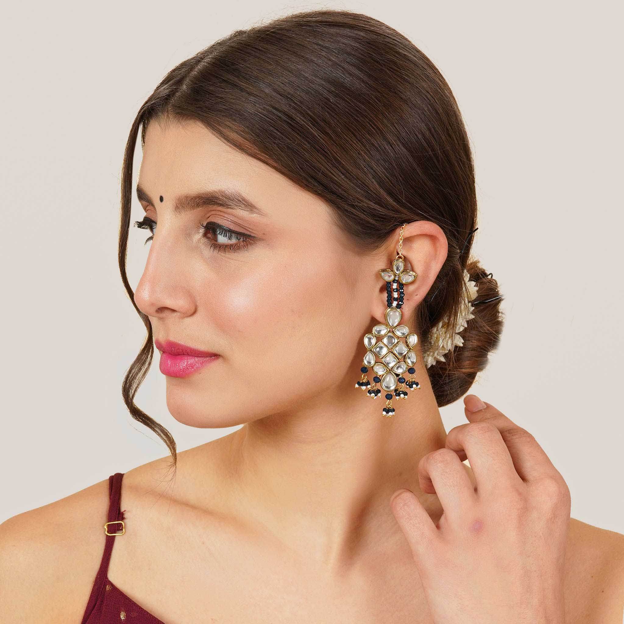 Traditional Kundan earrings in gold-tone, perfect for weddings and festive wear