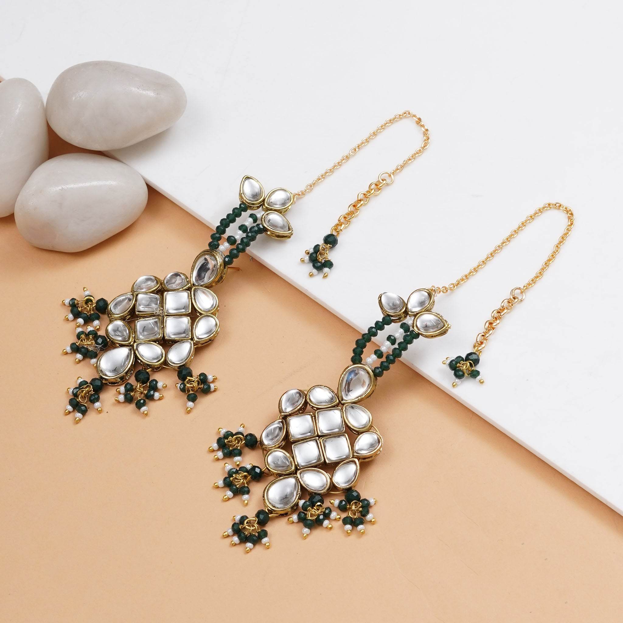 Traditional Kundan earrings in gold-tone, perfect for weddings and festive wear