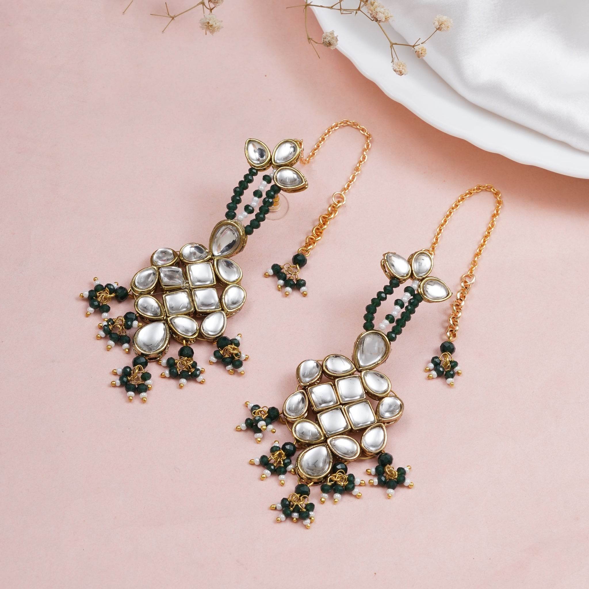 Traditional Kundan earrings in gold-tone, perfect for weddings and festive wear