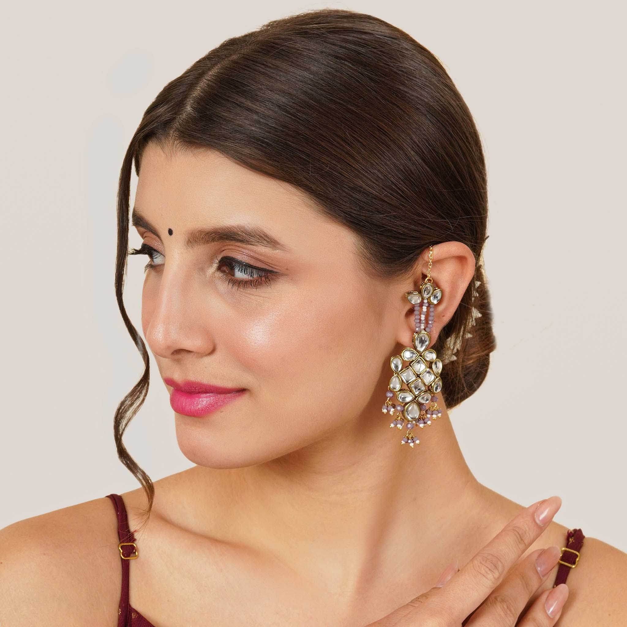 Traditional Kundan earrings in gold-tone, perfect for weddings and festive wear