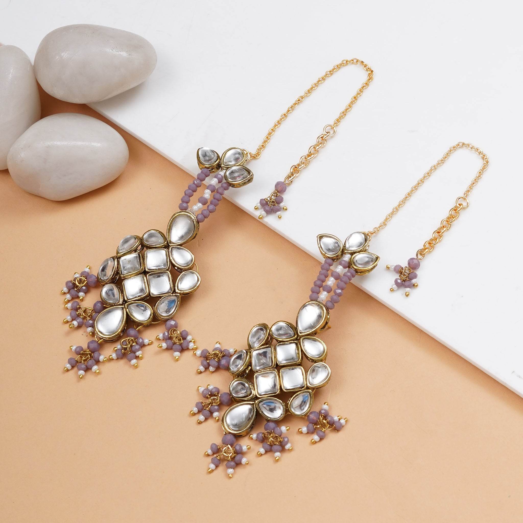 Traditional Kundan earrings in gold-tone, perfect for weddings and festive wear