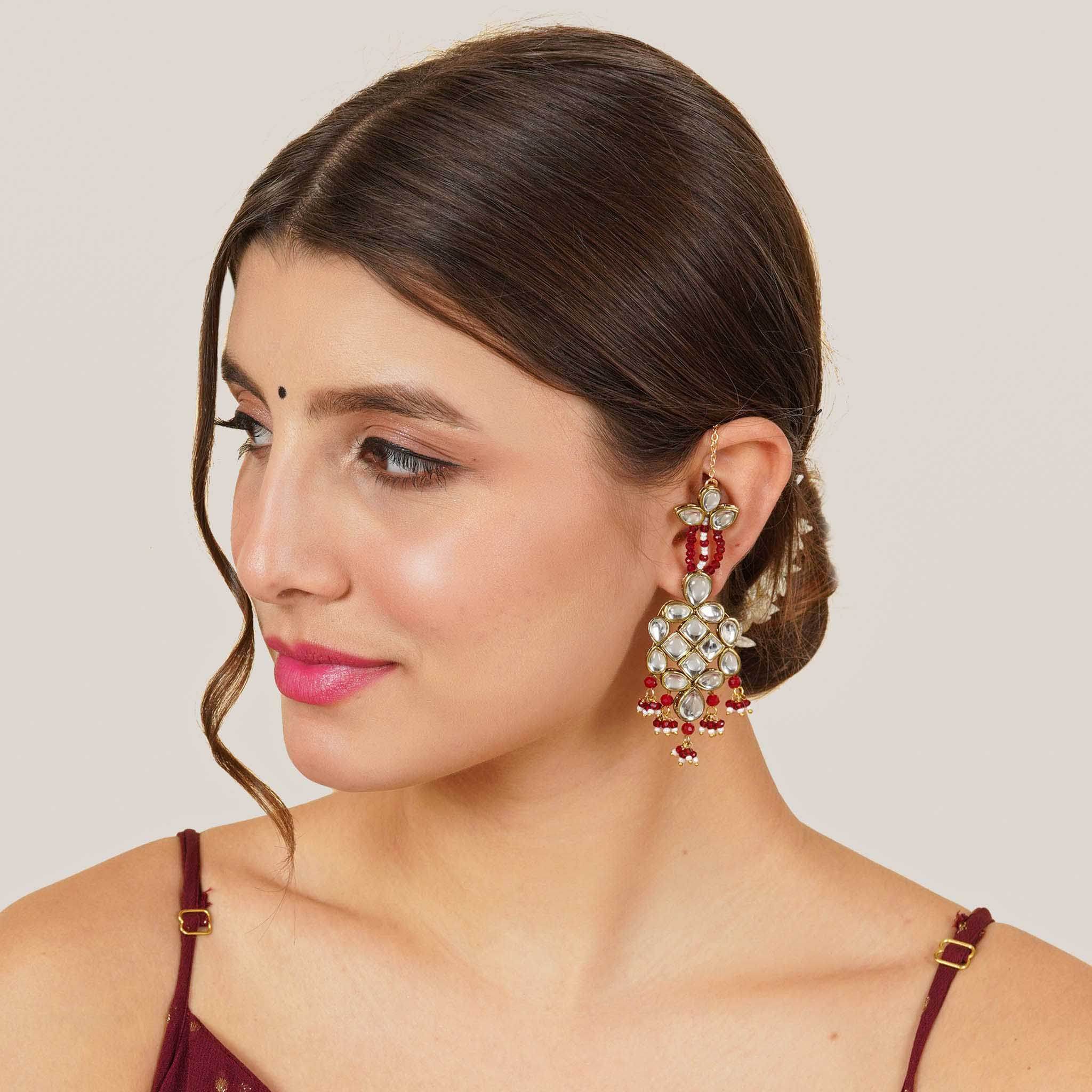 Traditional Kundan earrings in gold-tone, perfect for weddings and festive wear