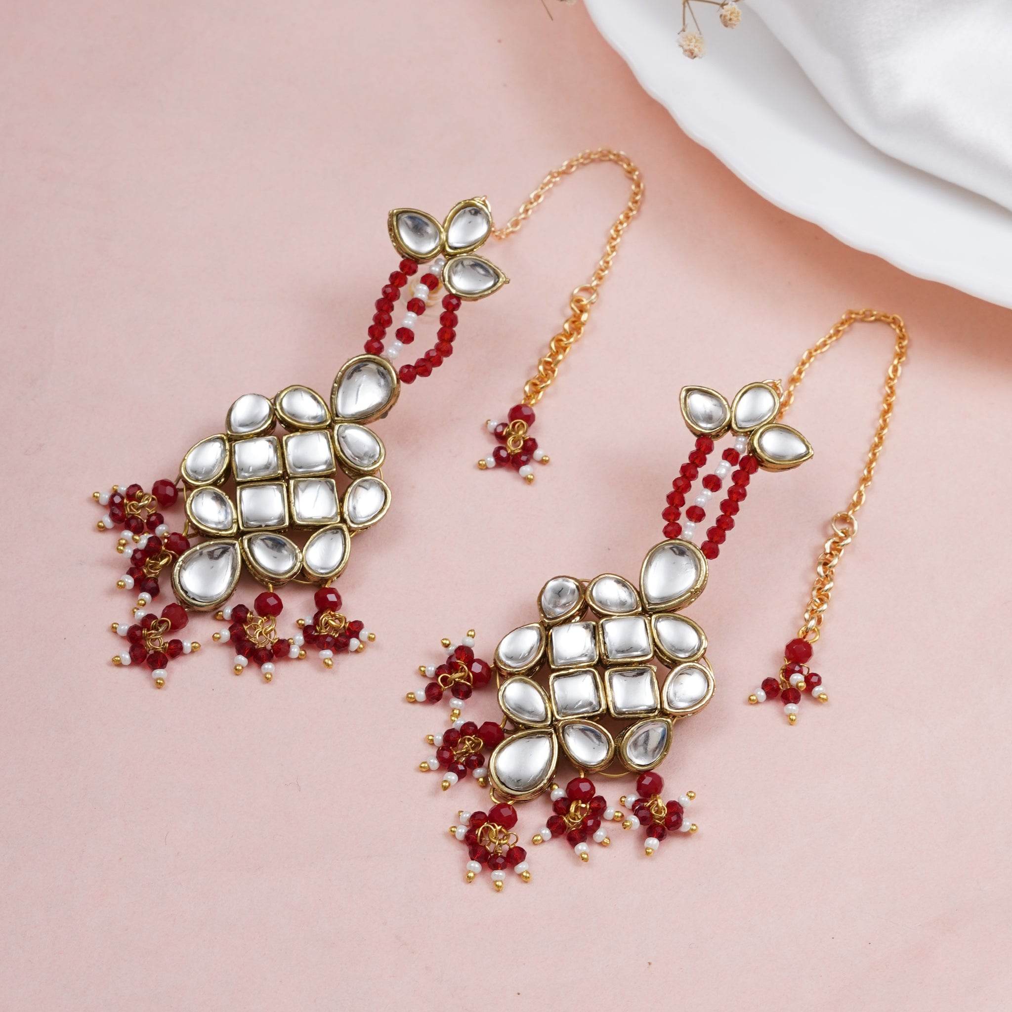 Traditional Kundan earrings in gold-tone, perfect for weddings and festive wear