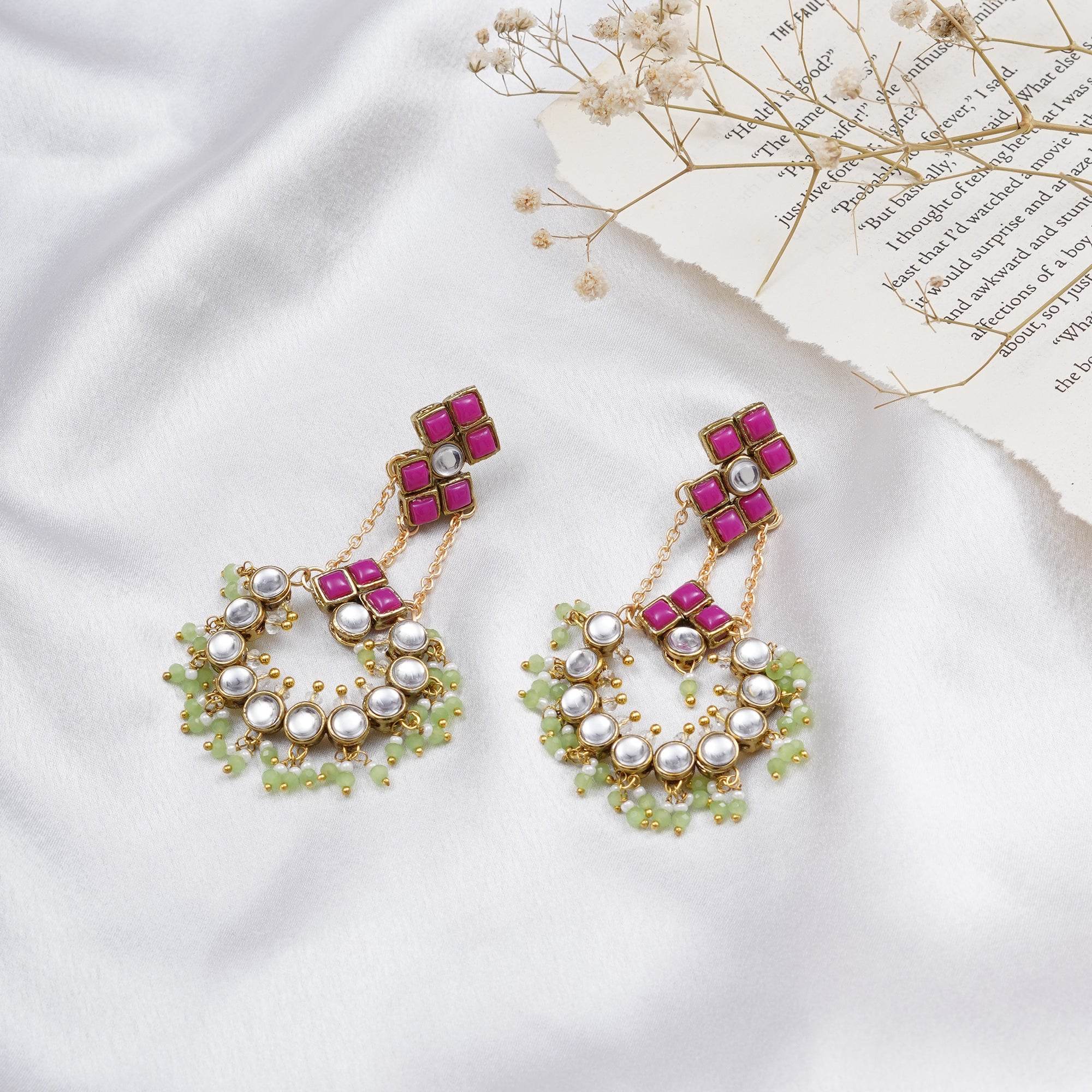 Traditional Kundan earrings in gold-tone, perfect for weddings and festive wear