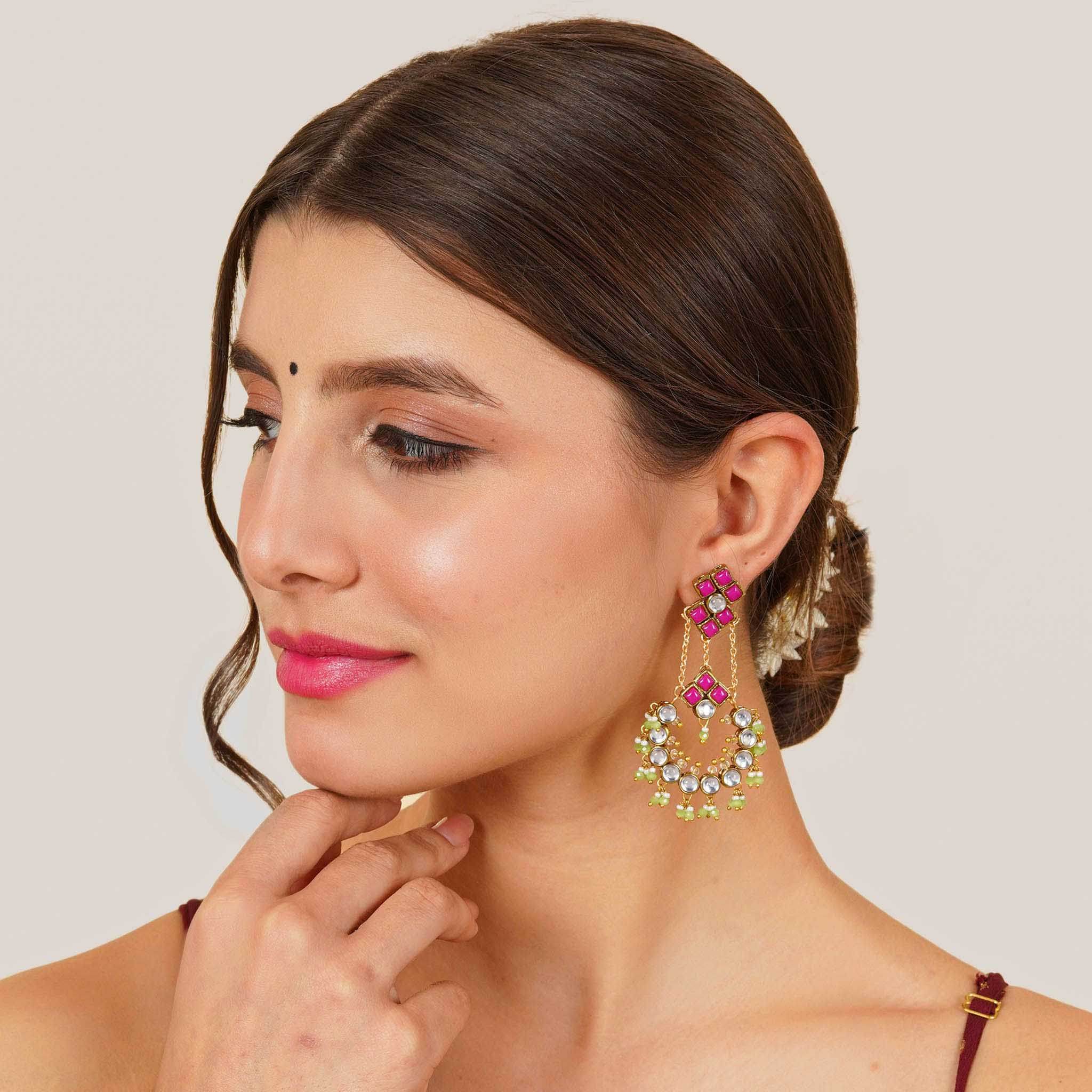 Traditional Kundan earrings in gold-tone, perfect for weddings and festive wear