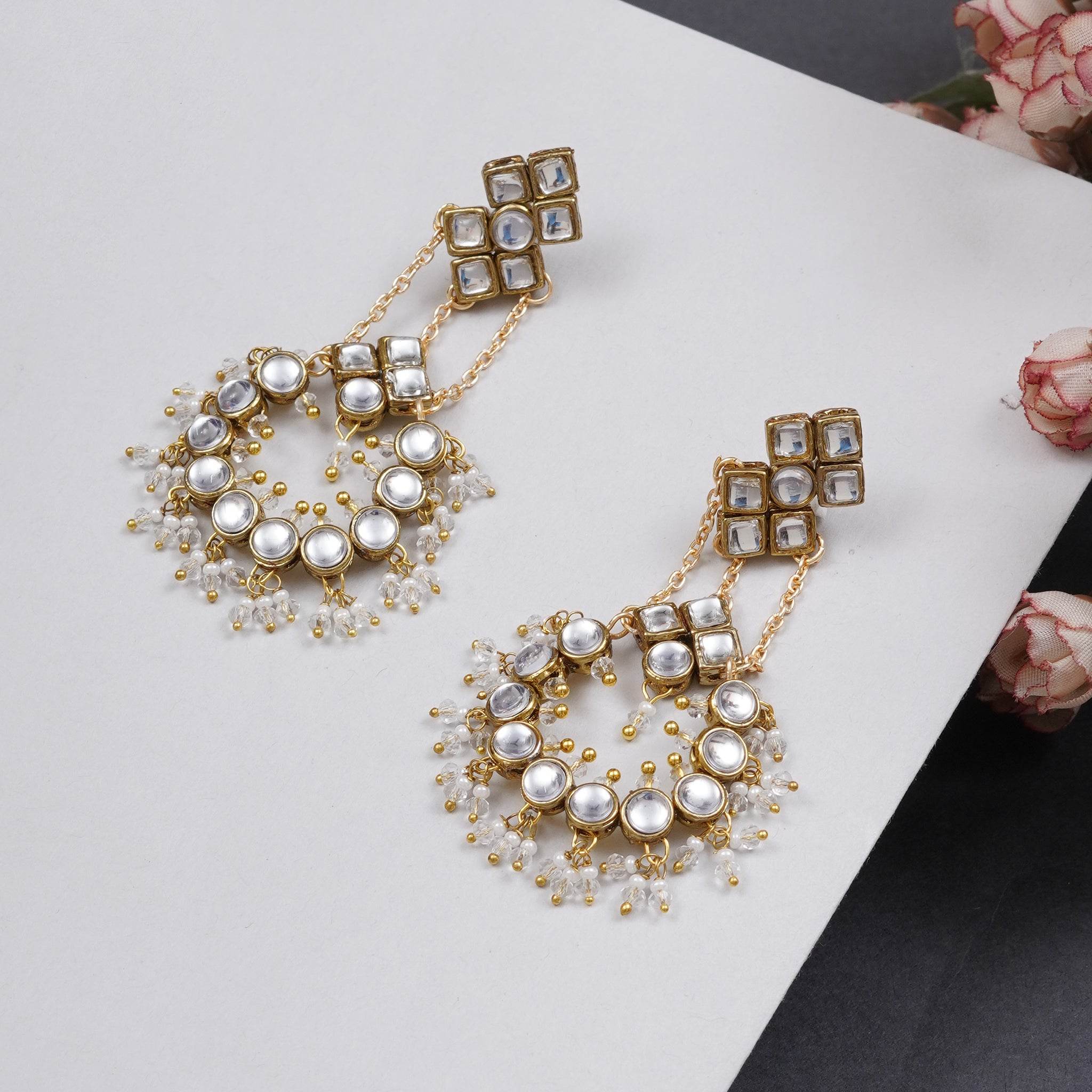 Traditional Kundan earrings in gold-tone, perfect for weddings and festive wear