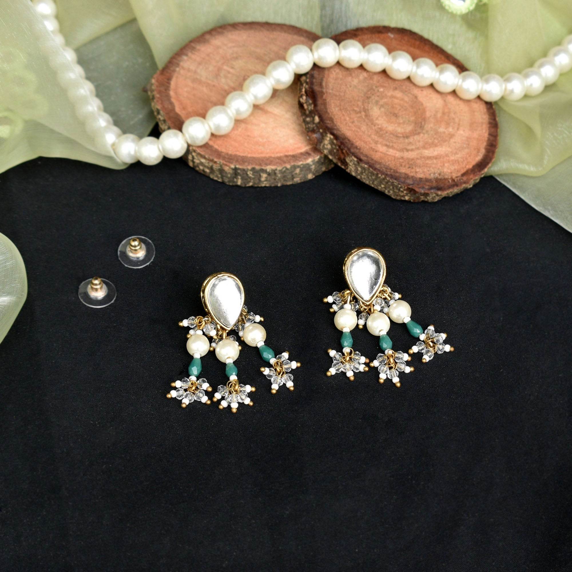 Traditional Kundan earrings in gold-tone, perfect for weddings and festive wear