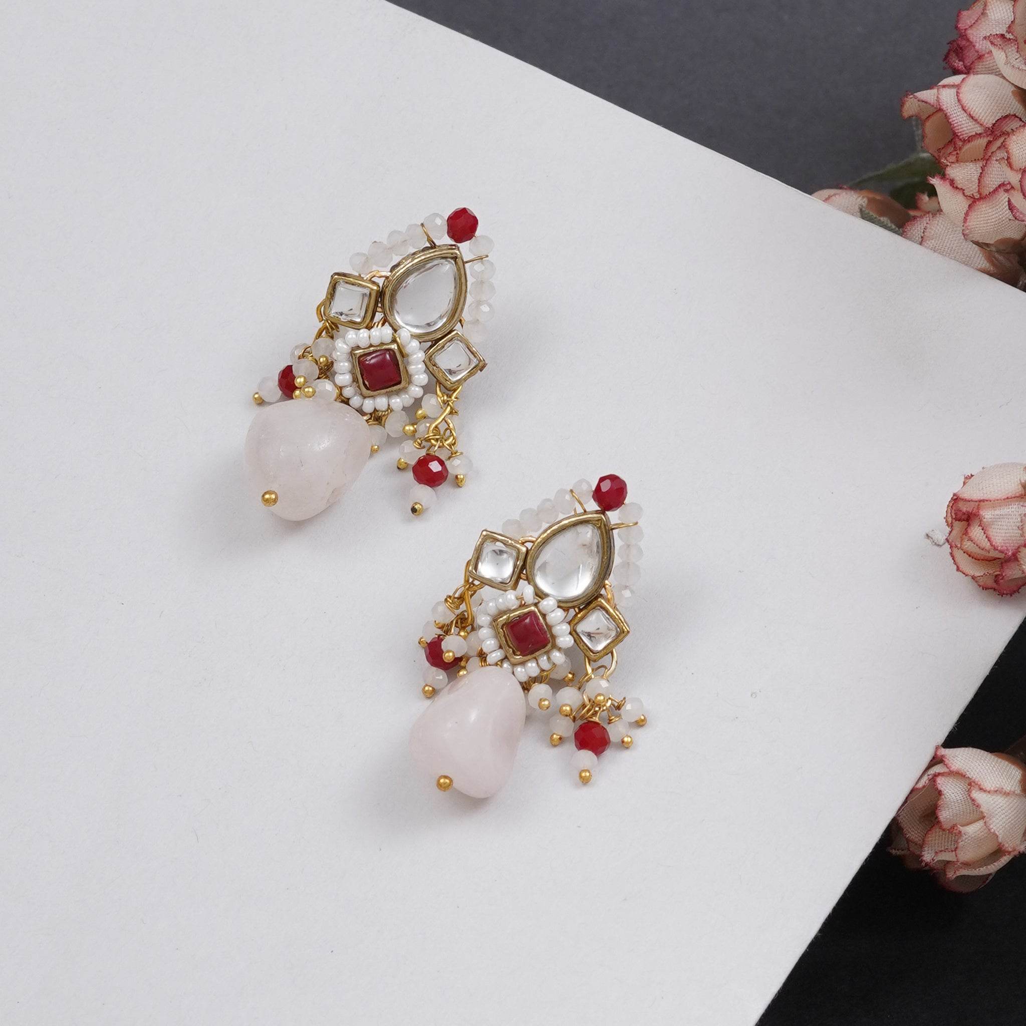 Traditional Kundan earrings in gold-tone, perfect for weddings and festive wear