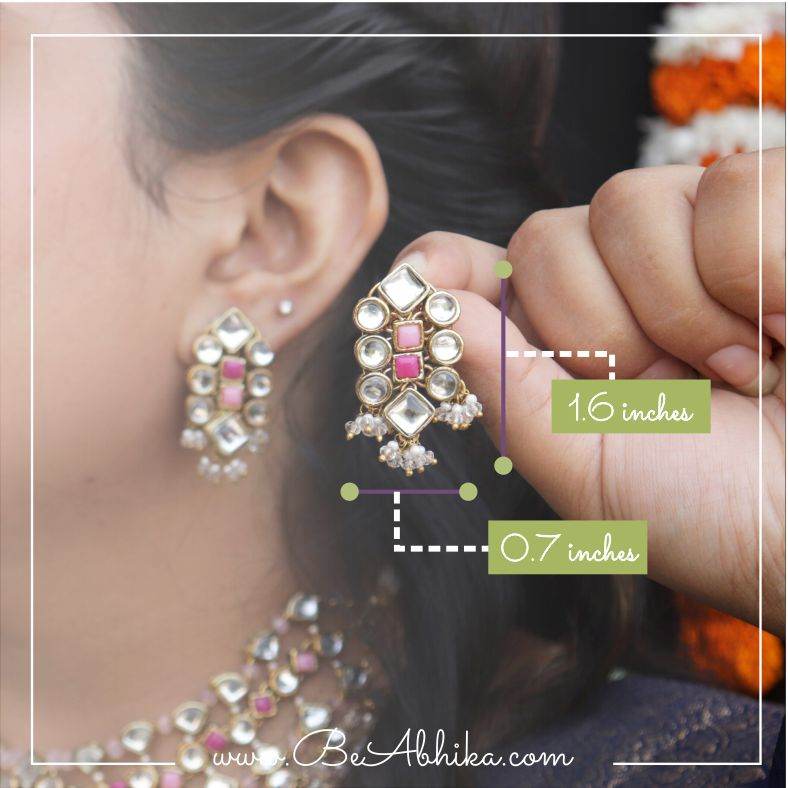 Traditional Kundan earrings in gold-tone, perfect for weddings and festive wear