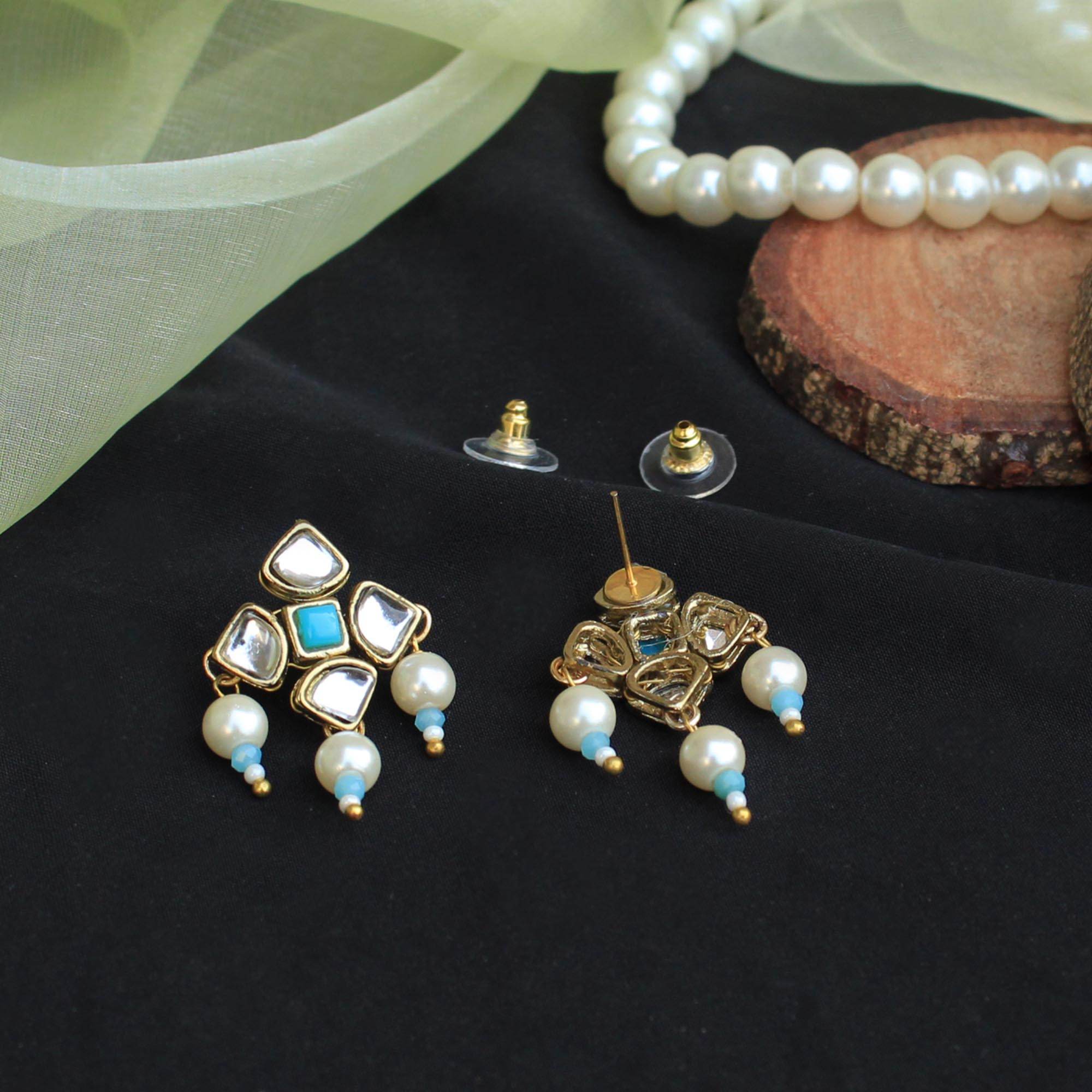 Traditional Kundan earrings in gold-tone, perfect for weddings and festive wear