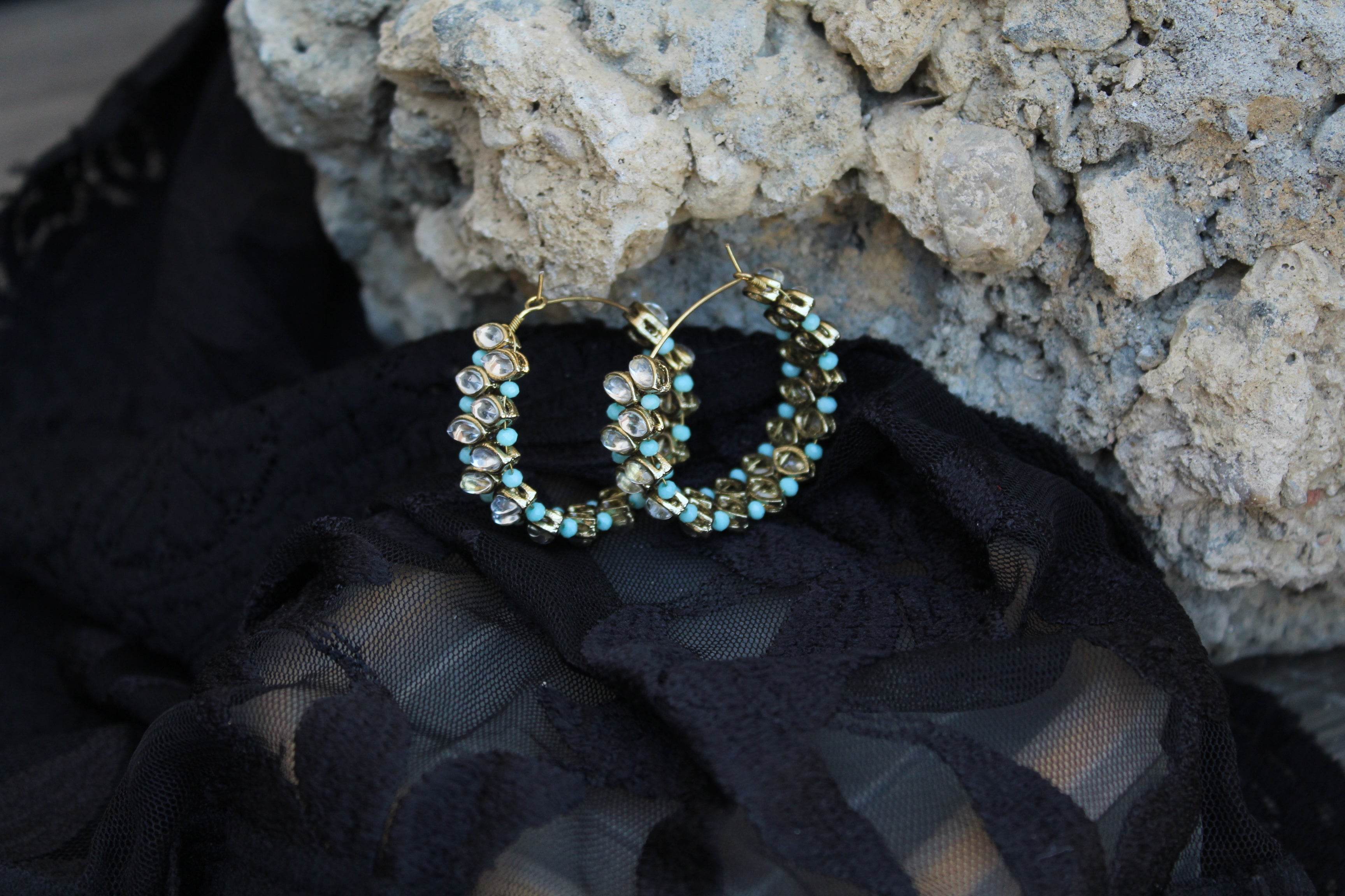 Traditional Kundan earrings in gold-tone, perfect for weddings and festive wear