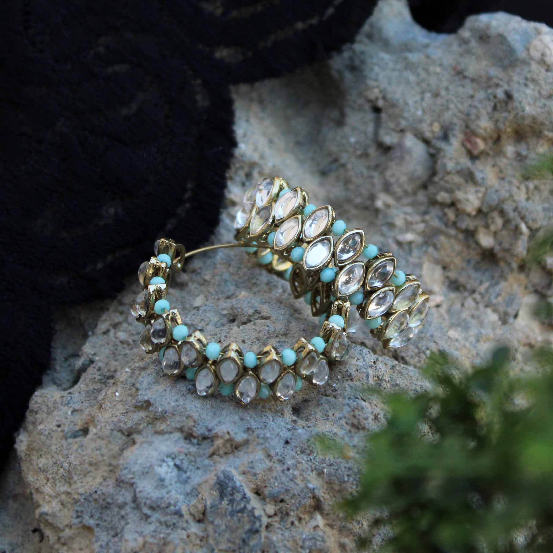 Traditional Kundan earrings in gold-tone, perfect for weddings and festive wear