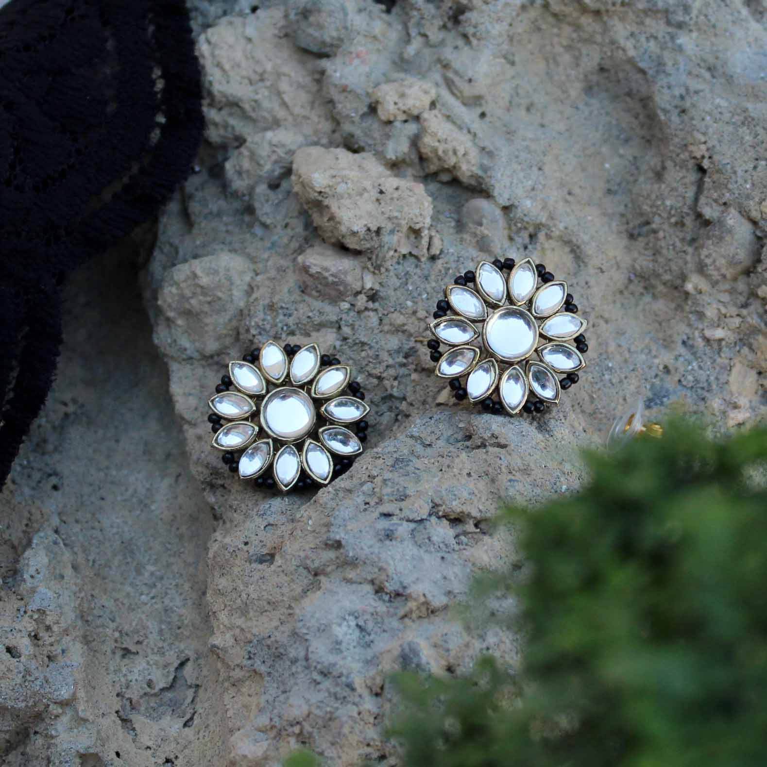 Traditional Kundan earrings in gold-tone, perfect for weddings and festive wear
