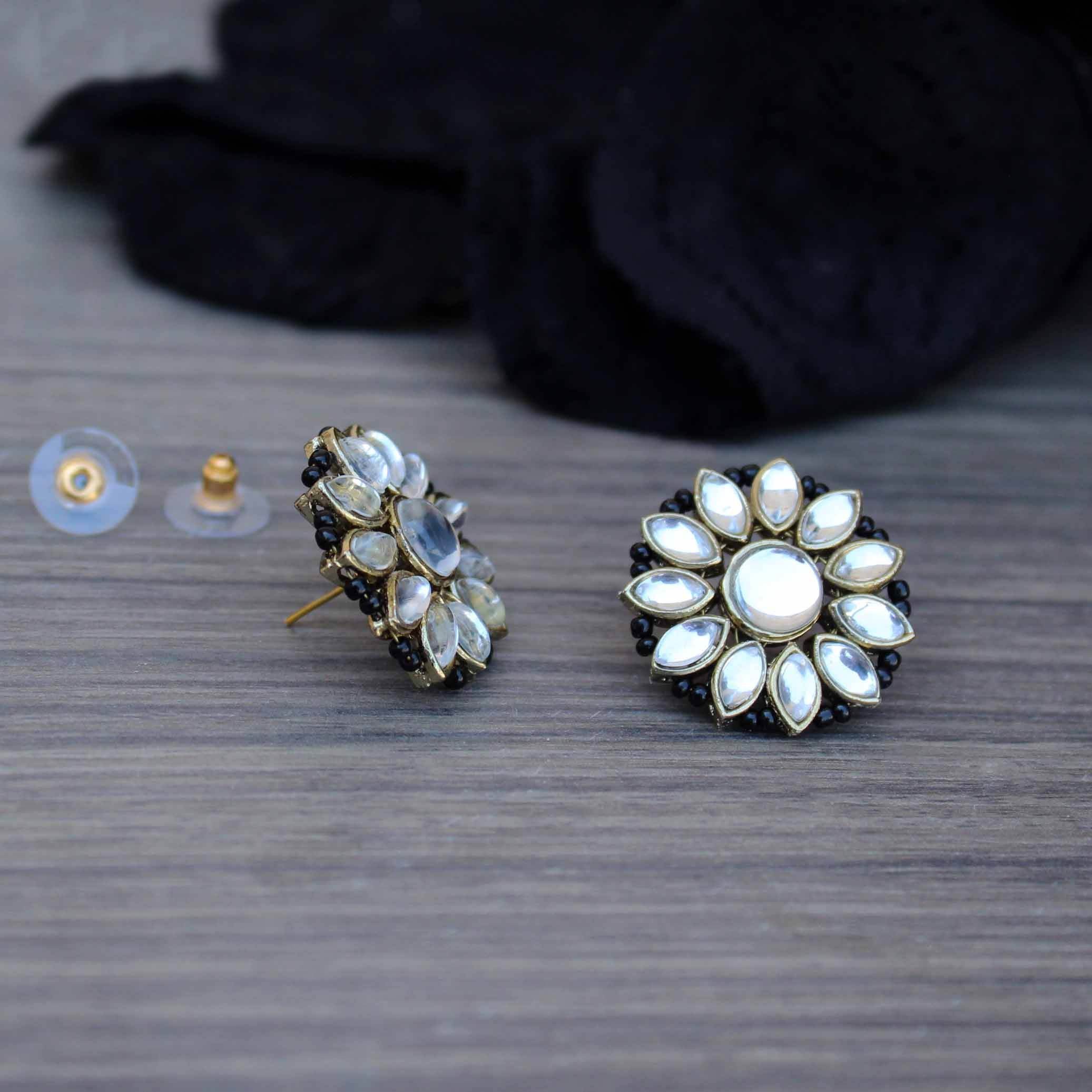 Traditional Kundan earrings in gold-tone, perfect for weddings and festive wear