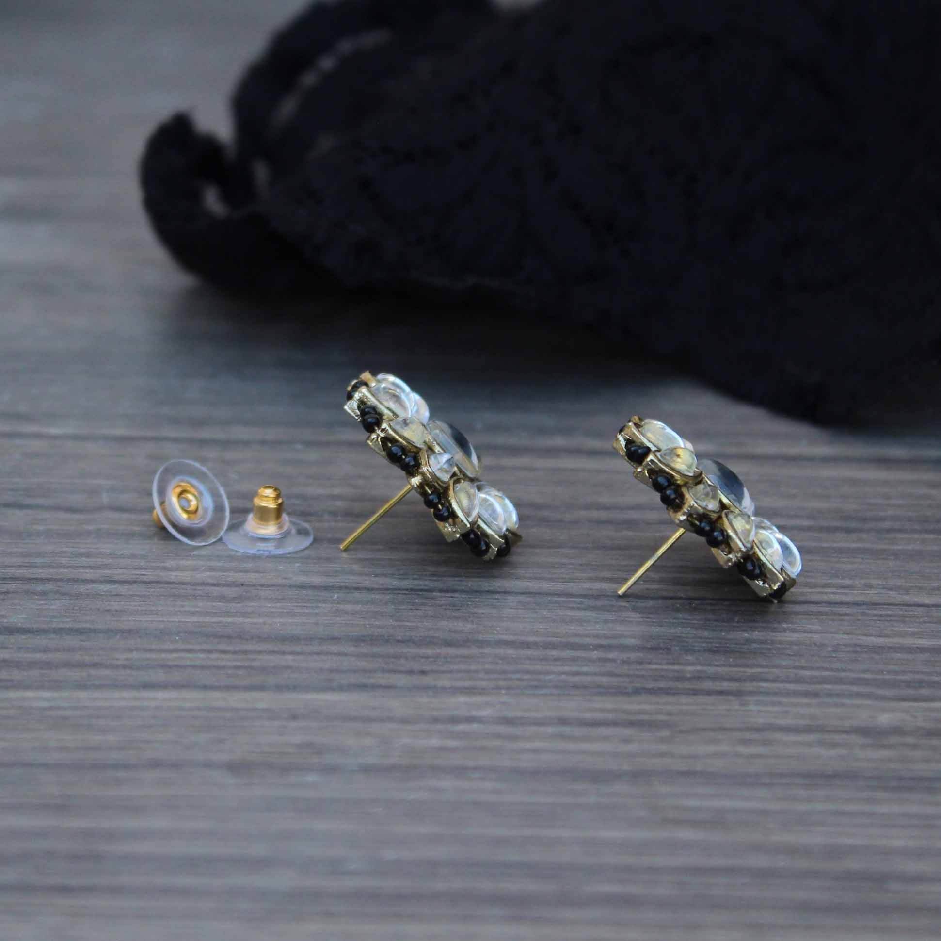 Traditional Kundan earrings in gold-tone, perfect for weddings and festive wear