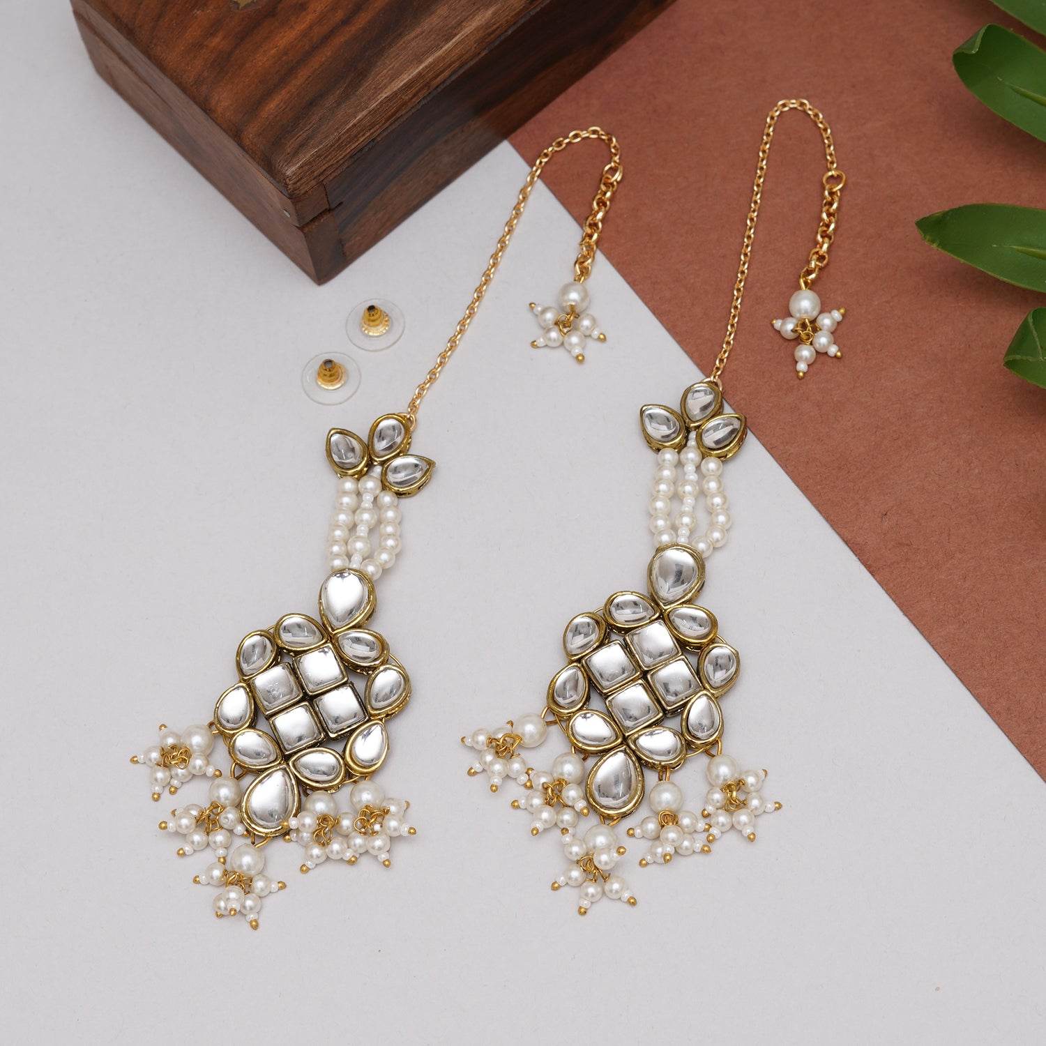 Traditional Kundan earrings in gold-tone, perfect for weddings and festive wear