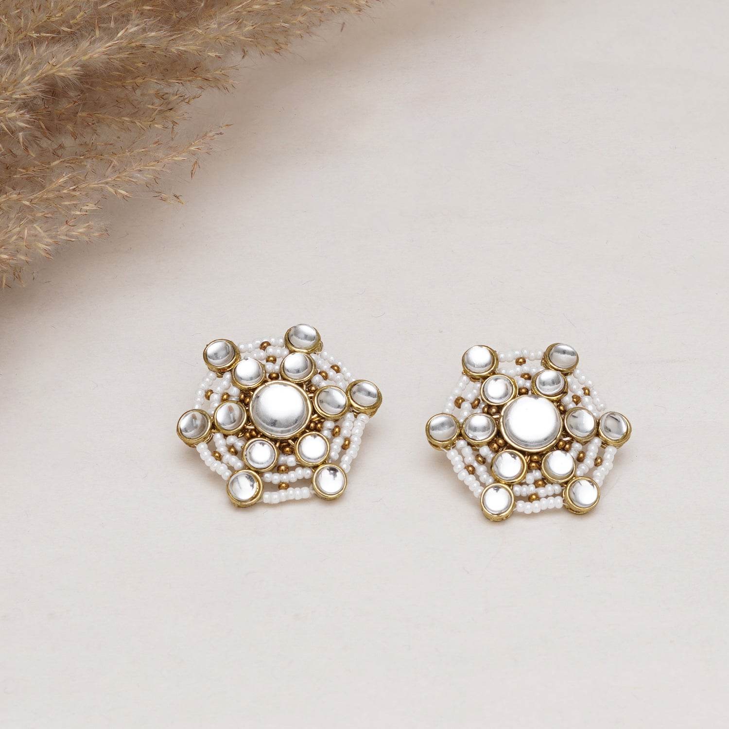 Traditional Kundan earrings in gold-tone, perfect for weddings and festive wear